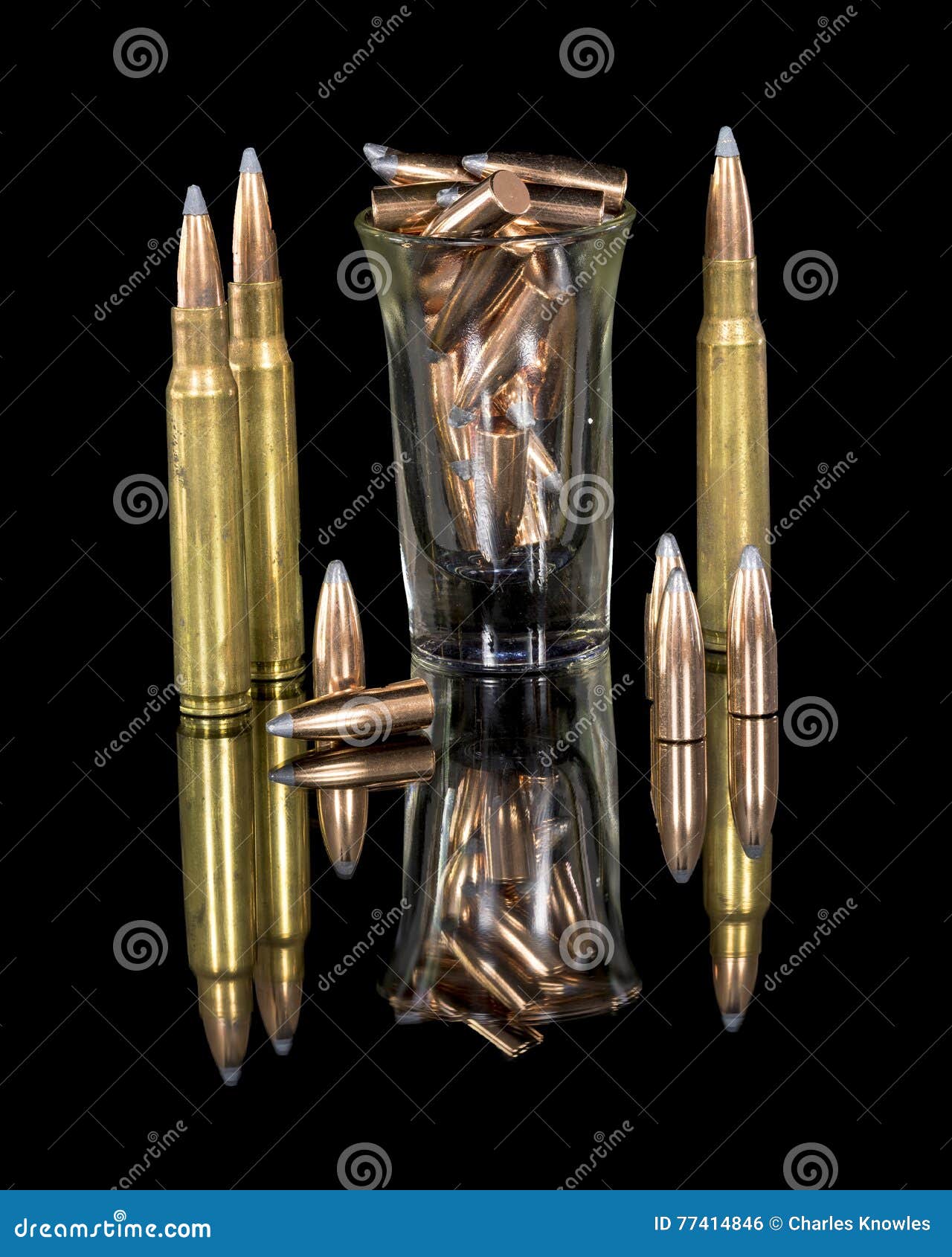 Rifle Bullets with Some Tips in a Shot Glass Stock Photo Image of