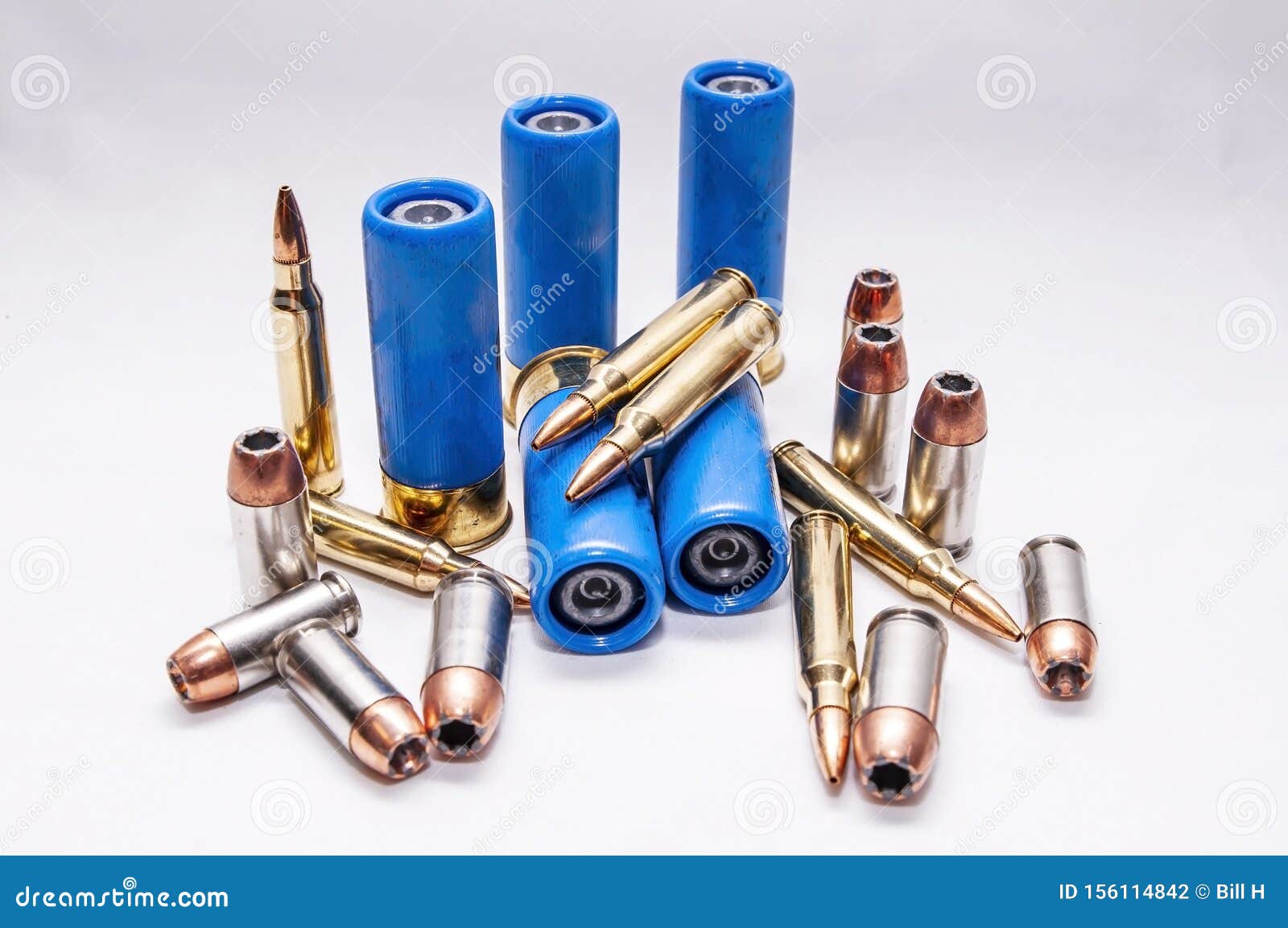 Rifled Slug Shotgun Shells with 223 Caliber Bullets Along with 45 Caliber  and 9mm Hollow Point Bullets Stock Photo - Image of shiny, group: 156114842