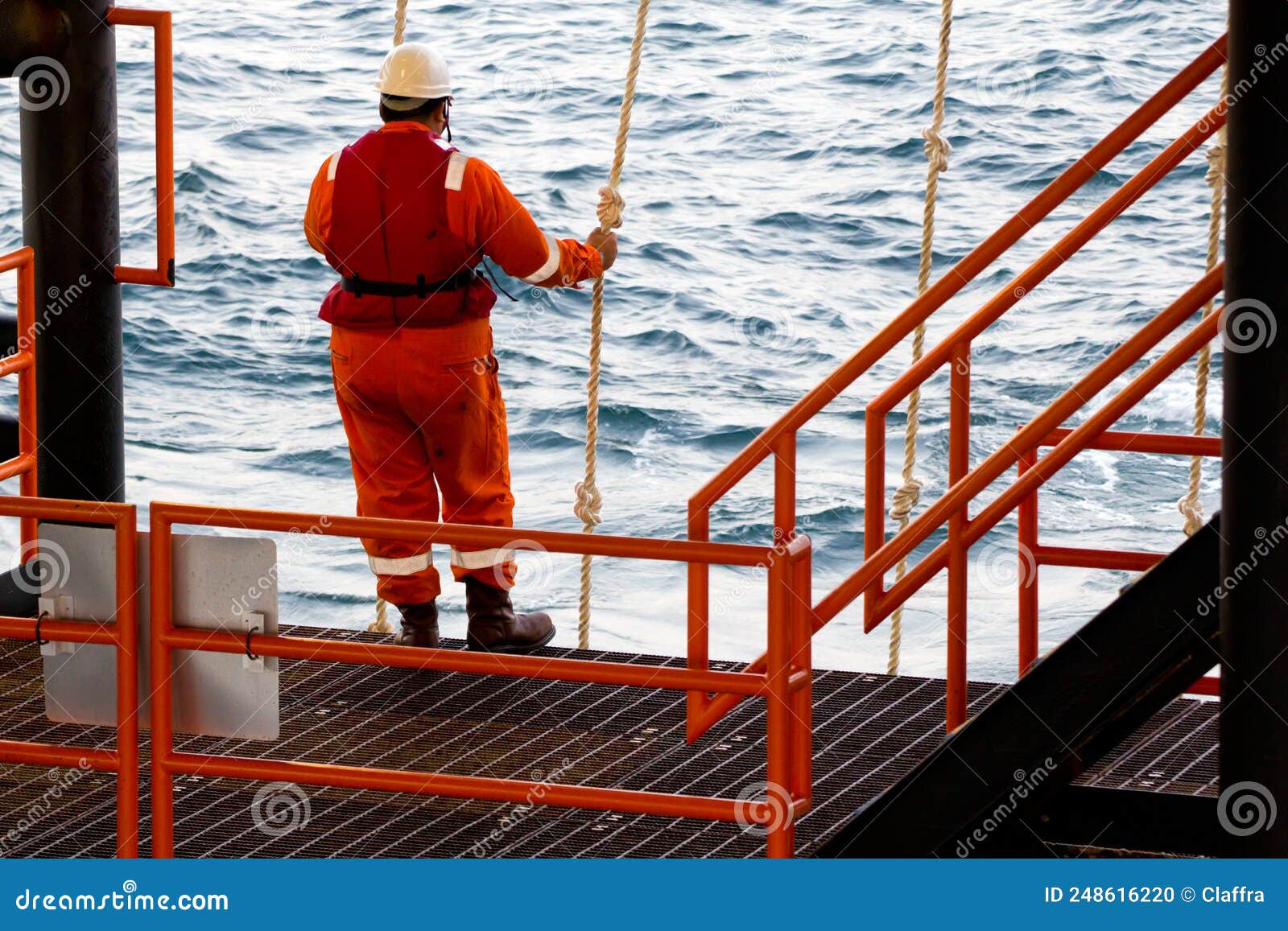 Rig Workers are Transported by Vessel To Offshore Rigs Editorial