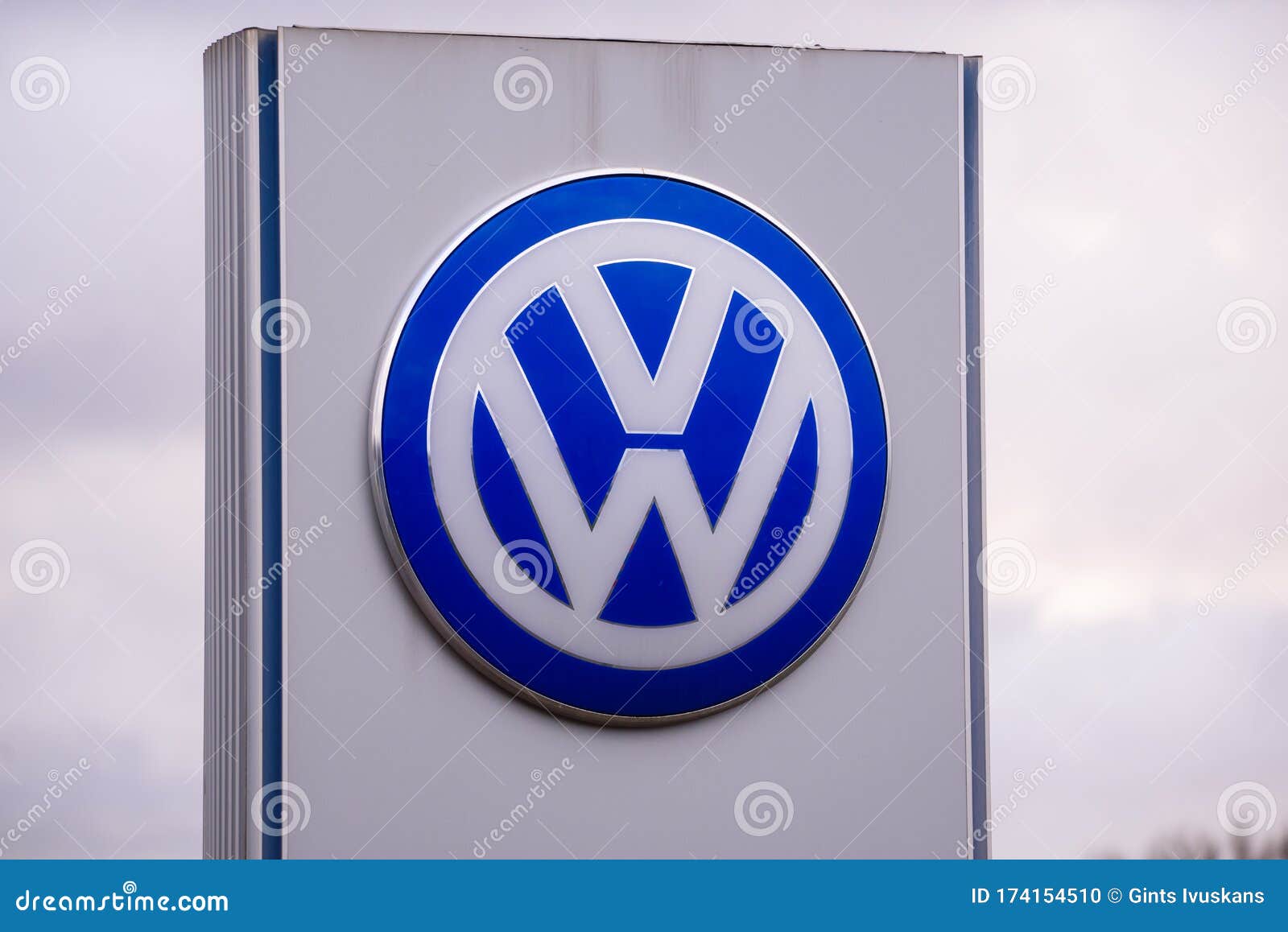 Volkswagen Company Logo Near Automobile Centre. Editorial Image - Image