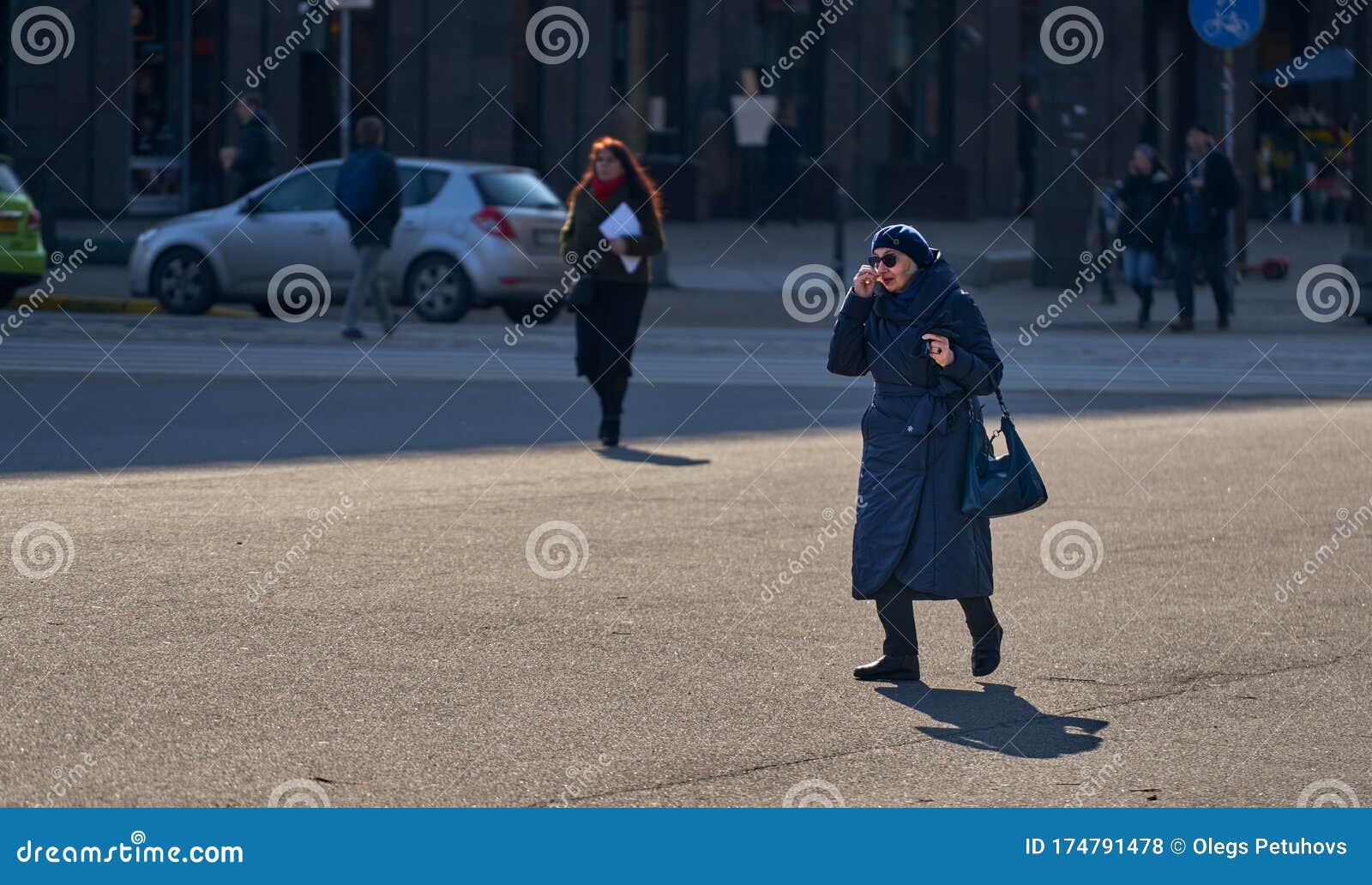 06-03-2020 Riga, Latvia Woman Walking on the Street Editorial Stock ...