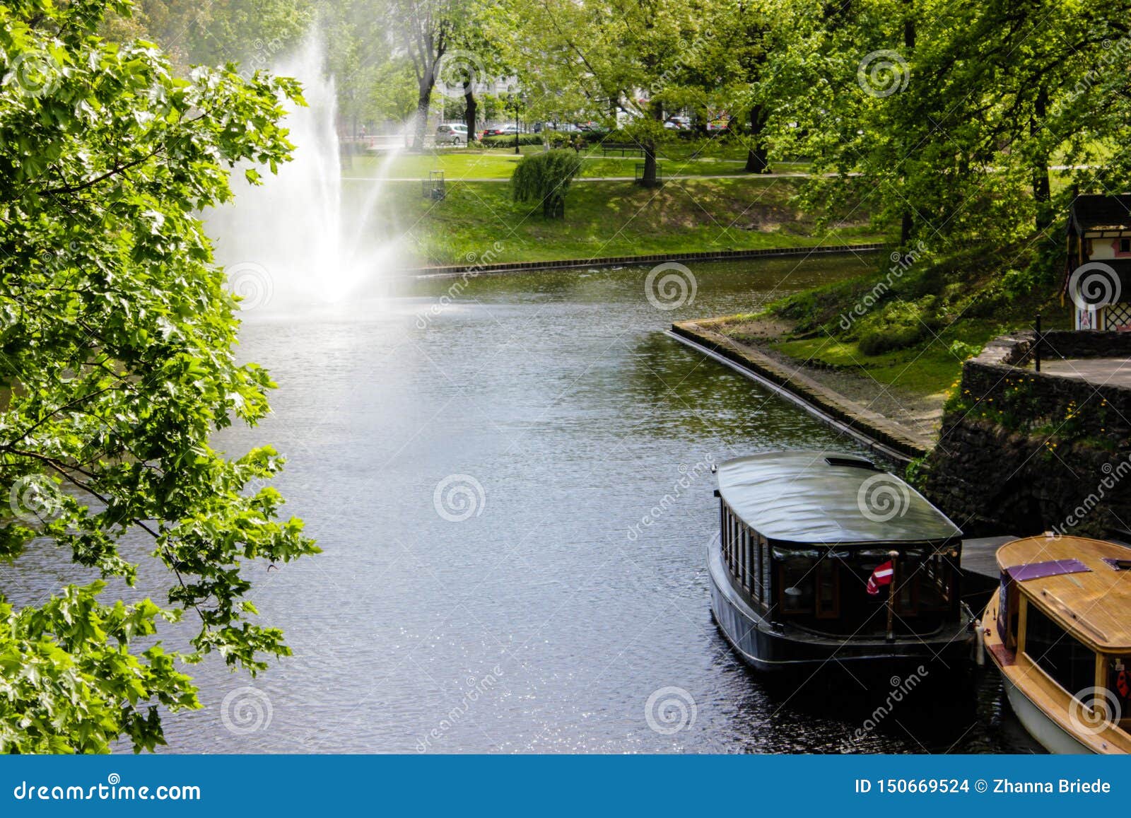 riga-city-channel-and-riveside-in-spring-2019-editorial-stock-image