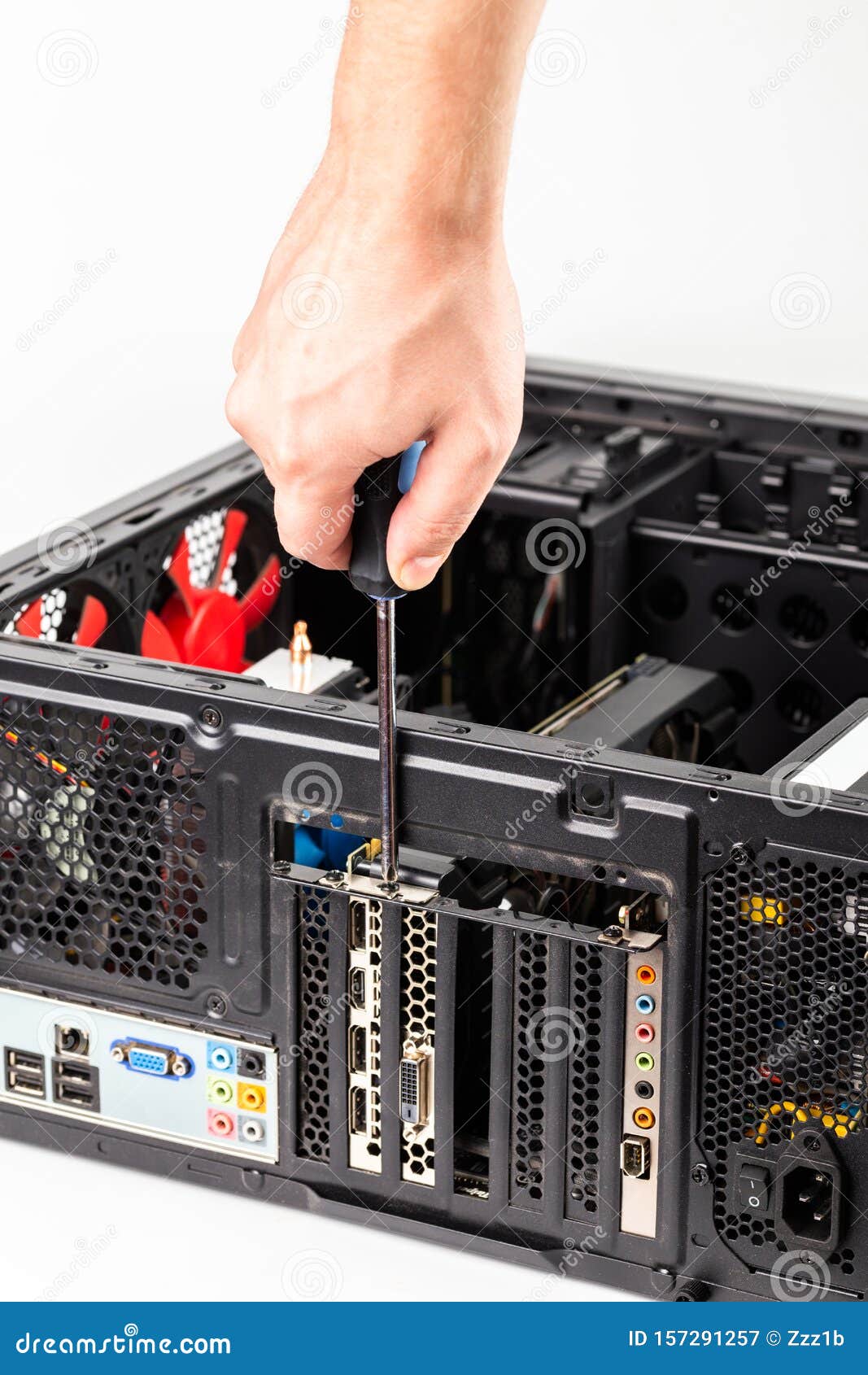 Right Caucasian Hand Unscrewing a Video Card Bracket while Maintenance