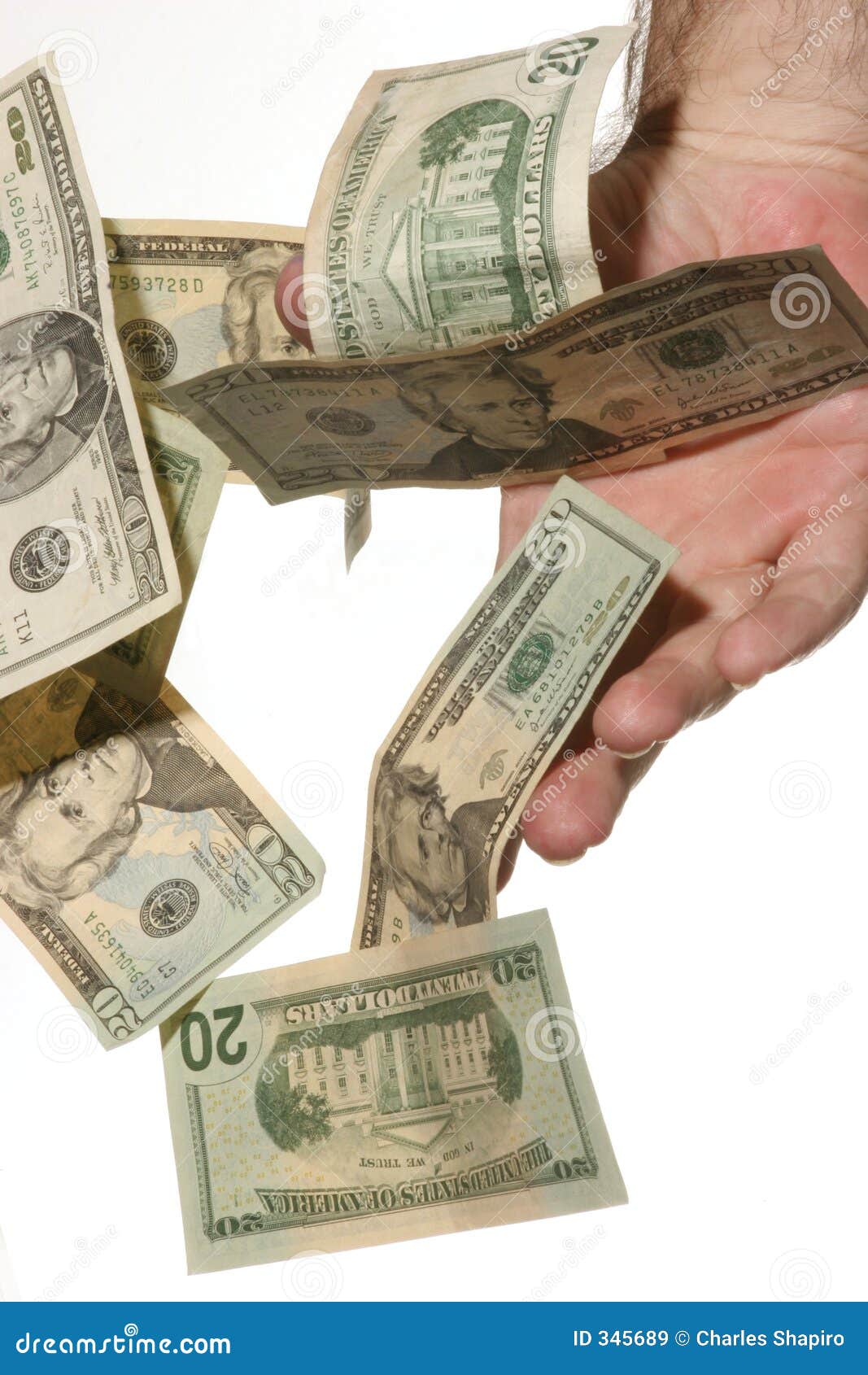 Money Are Threw To Pile Of Coins By Shovel RoyaltyFree Stock