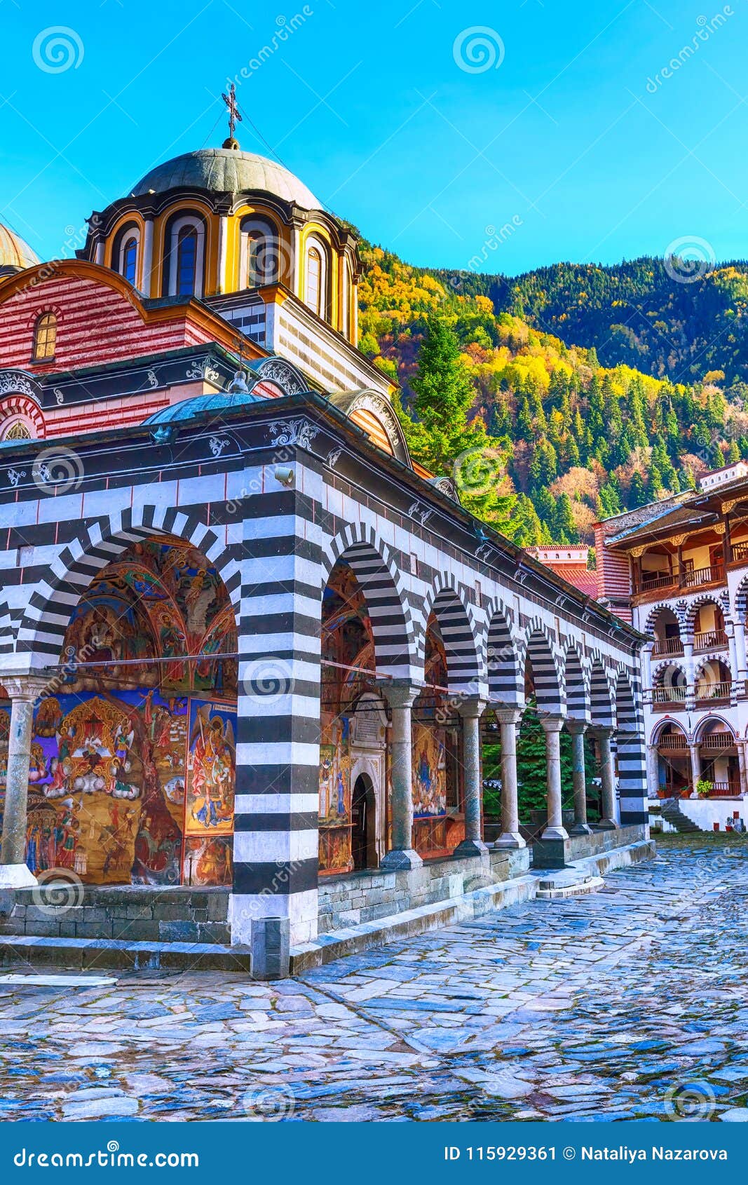 rila monastery, bulgaria and autumn mountains