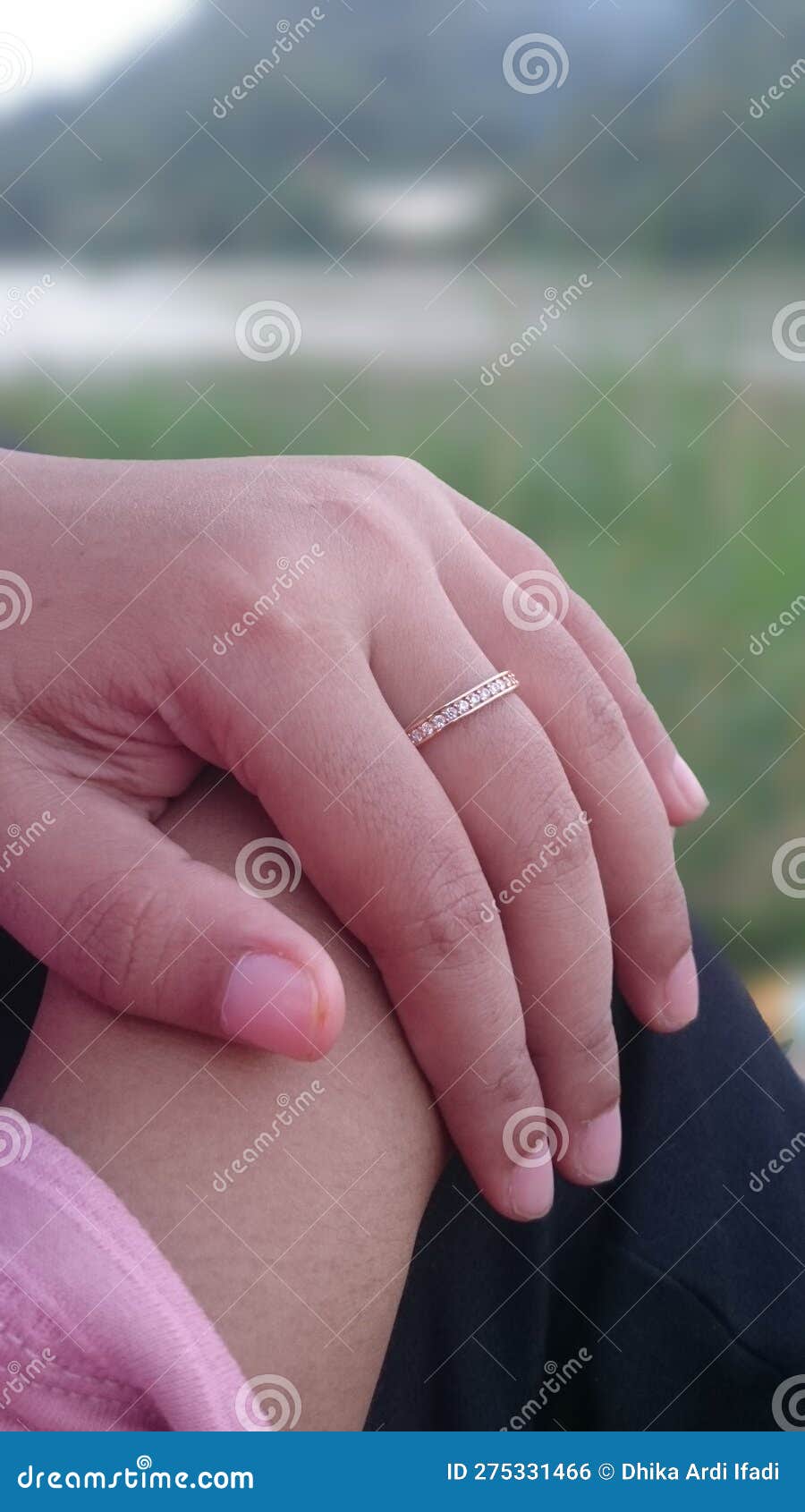 Ring on the Ring Finger by a Beautiful River Stock Photo Image of