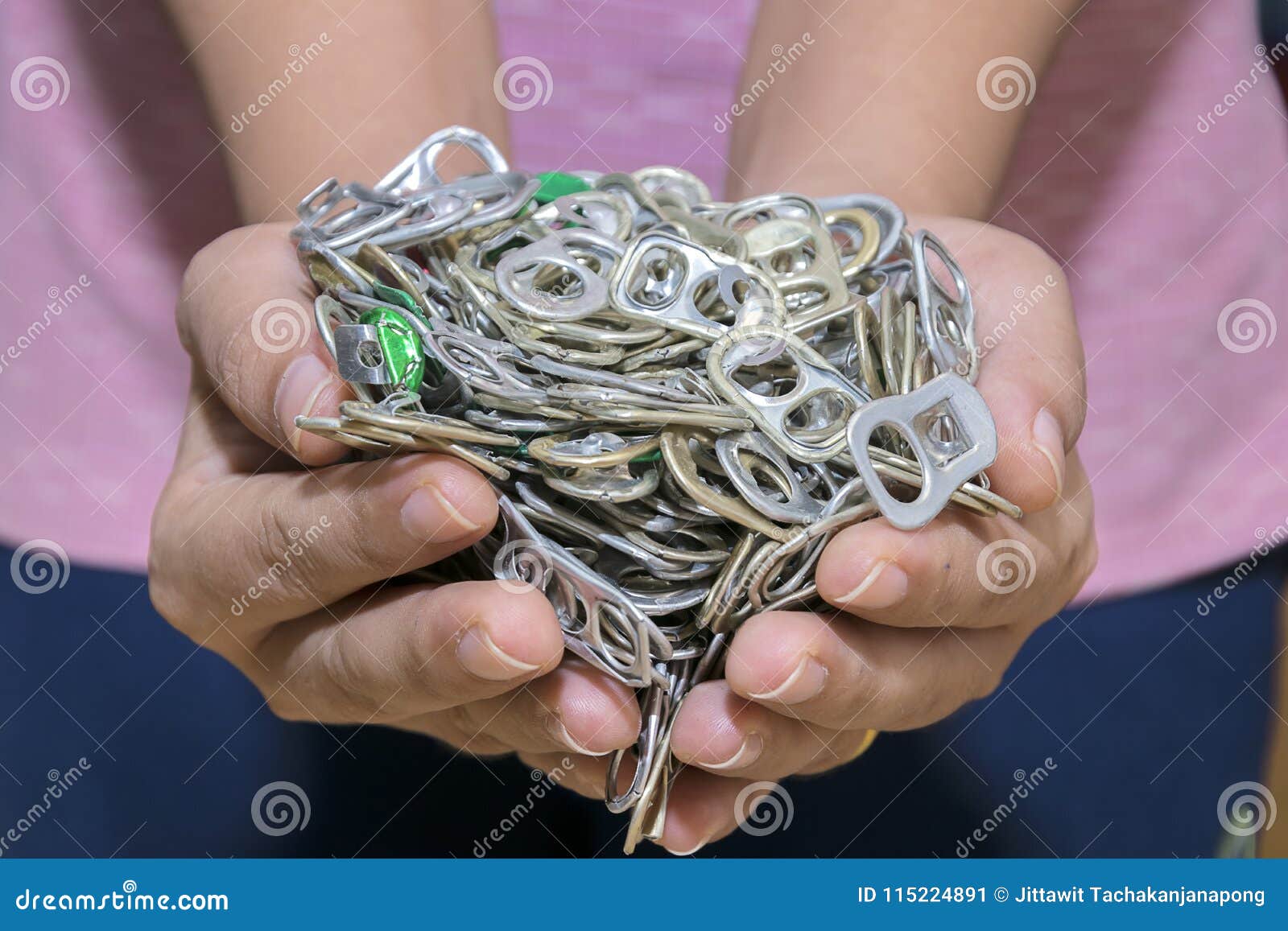 ,Ring Pull Tab Aluminum Pop Tops of Cans in the Hands of Women. Stock Image Image of circle