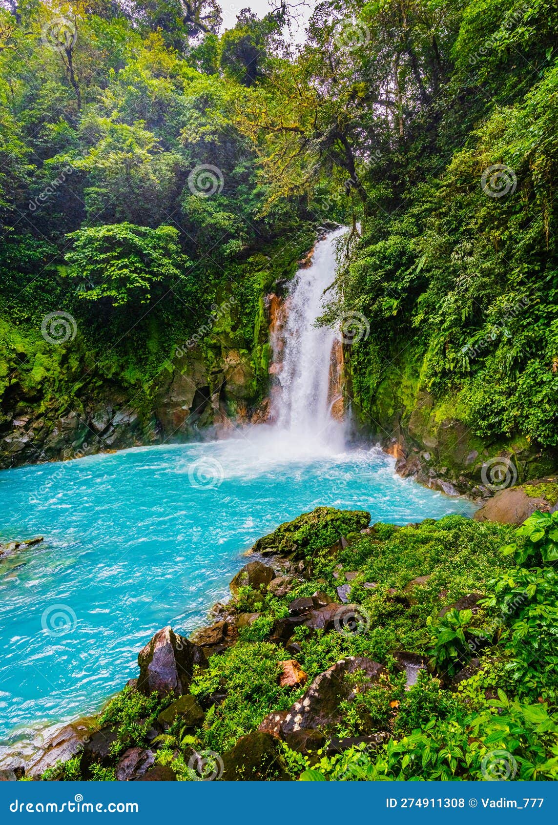 rio celeste waterfall and pond in tenorio volcano national park, alajuela province, costa rica