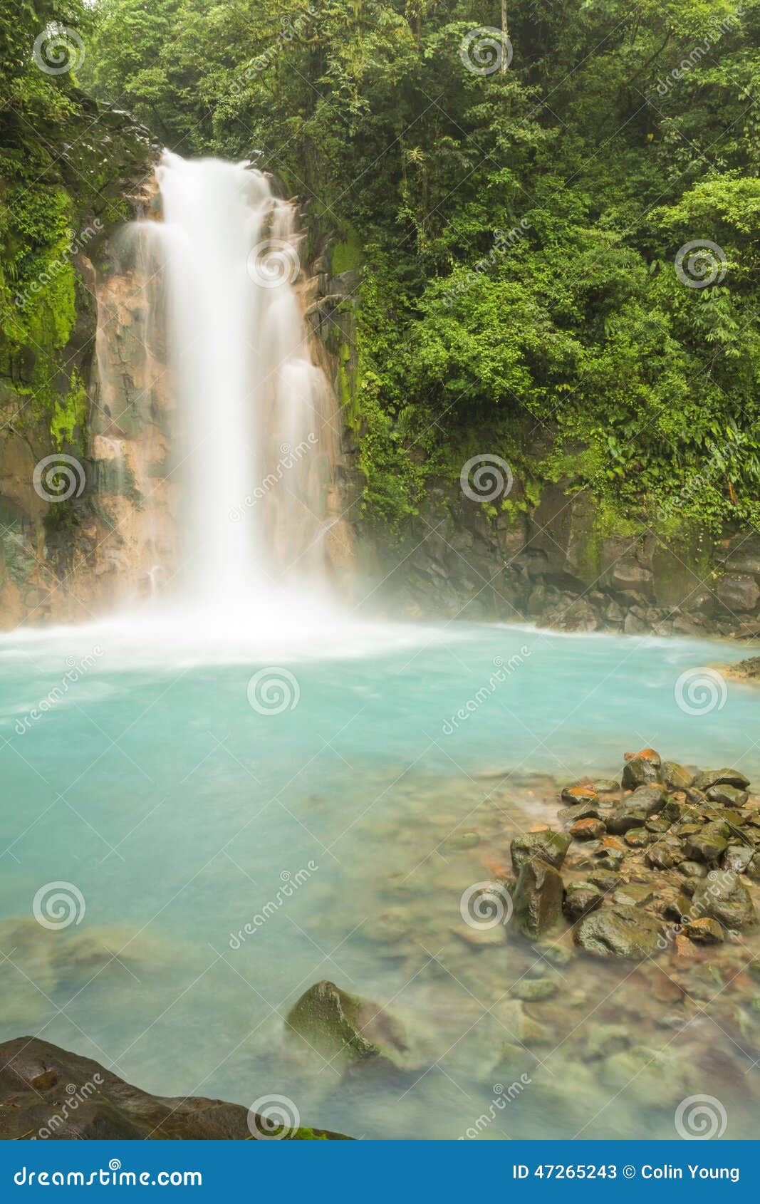 rio celeste waterfall and sulphurous rocks