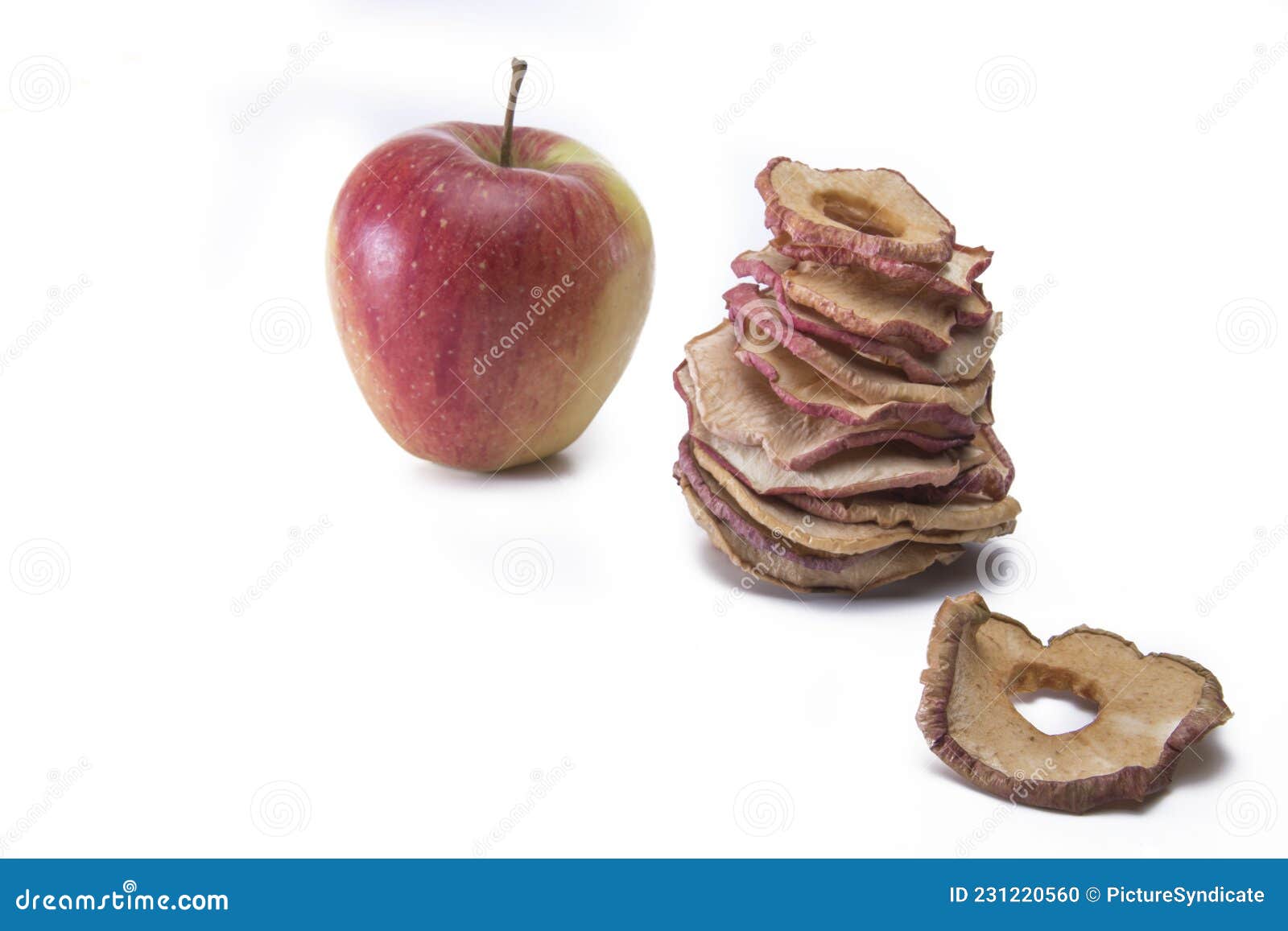 Ripe Apple with Dried Fruit Slices Isolated on White Stock Photo
