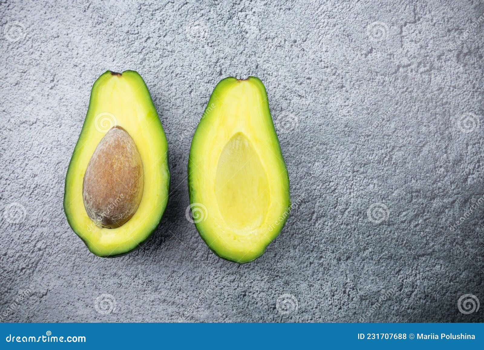 Ripe Avocado Cut Lengthwise into Two Pieces on Gray Surface Stock Photo Image of vegetable