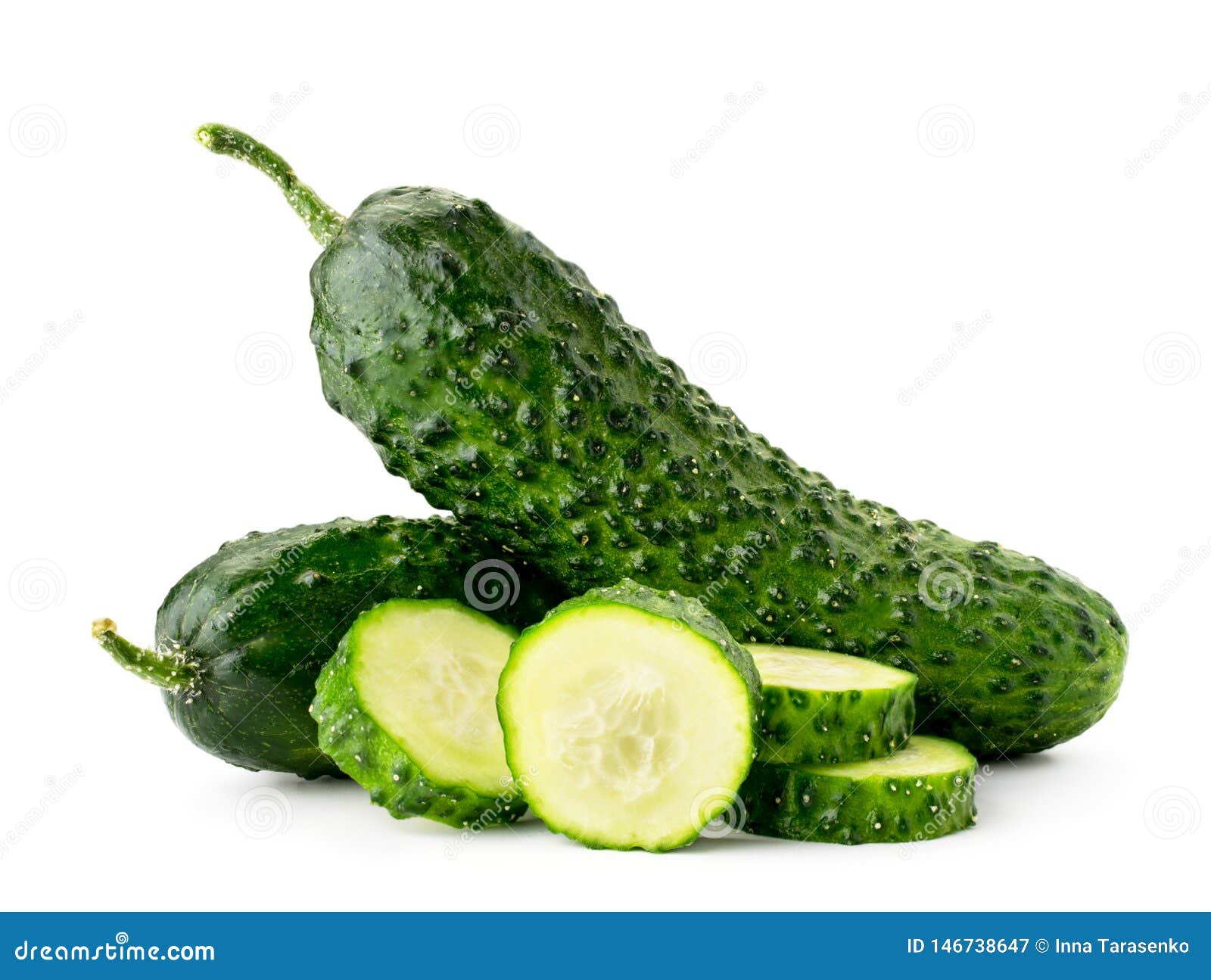 ripe cucumbers and slices close-up on a white background. .