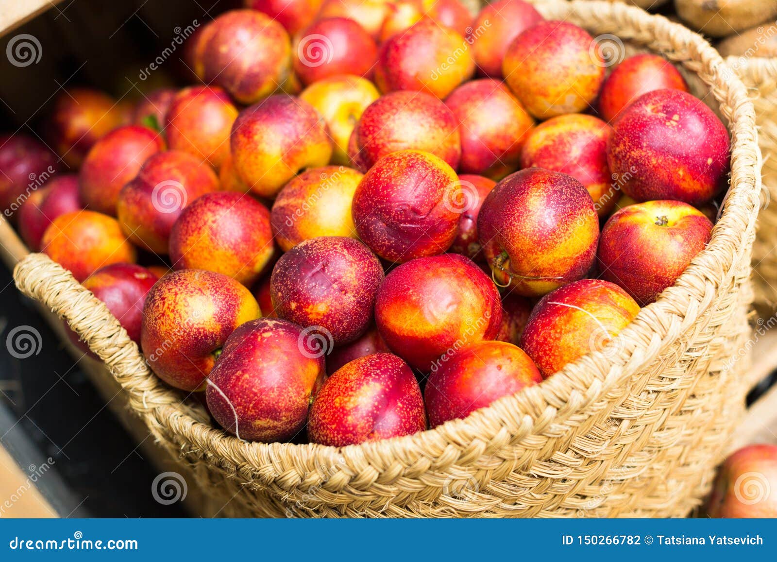 Ripe Nectarines in Wicker Baskets on Counter Stock Photo Image of