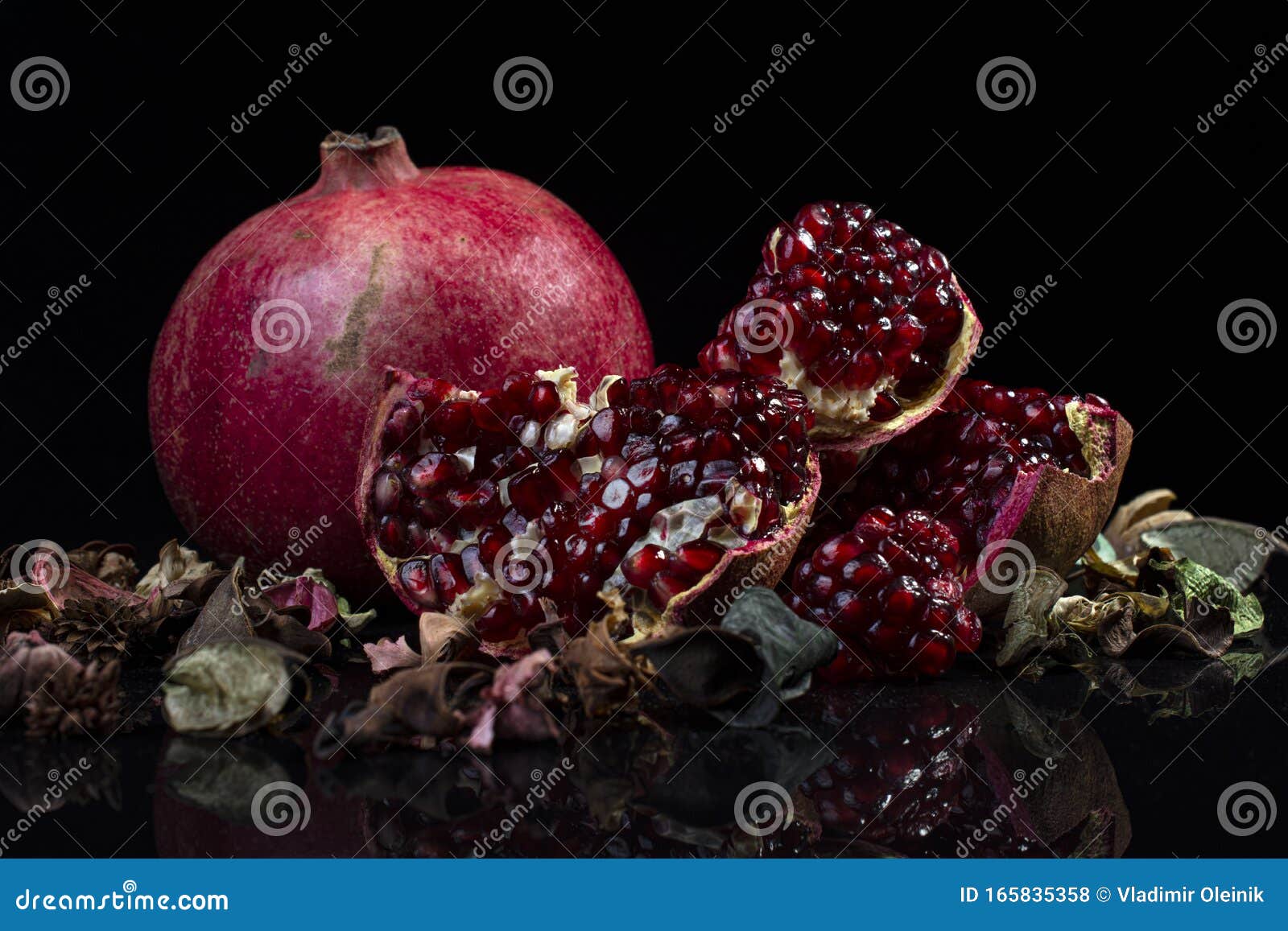 ripe pomegranate rustic style on black  background