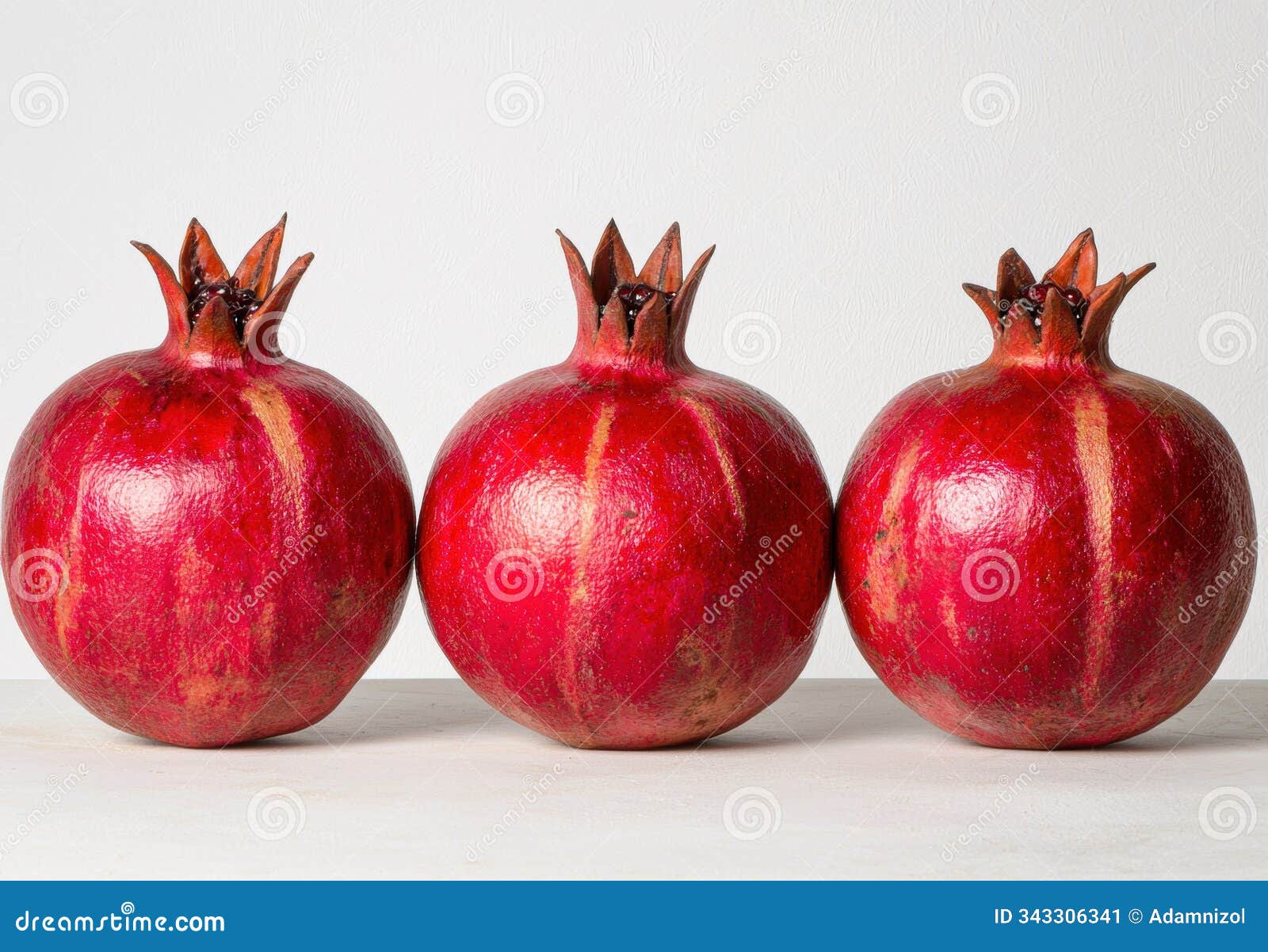 ripe pomegranates on a white background