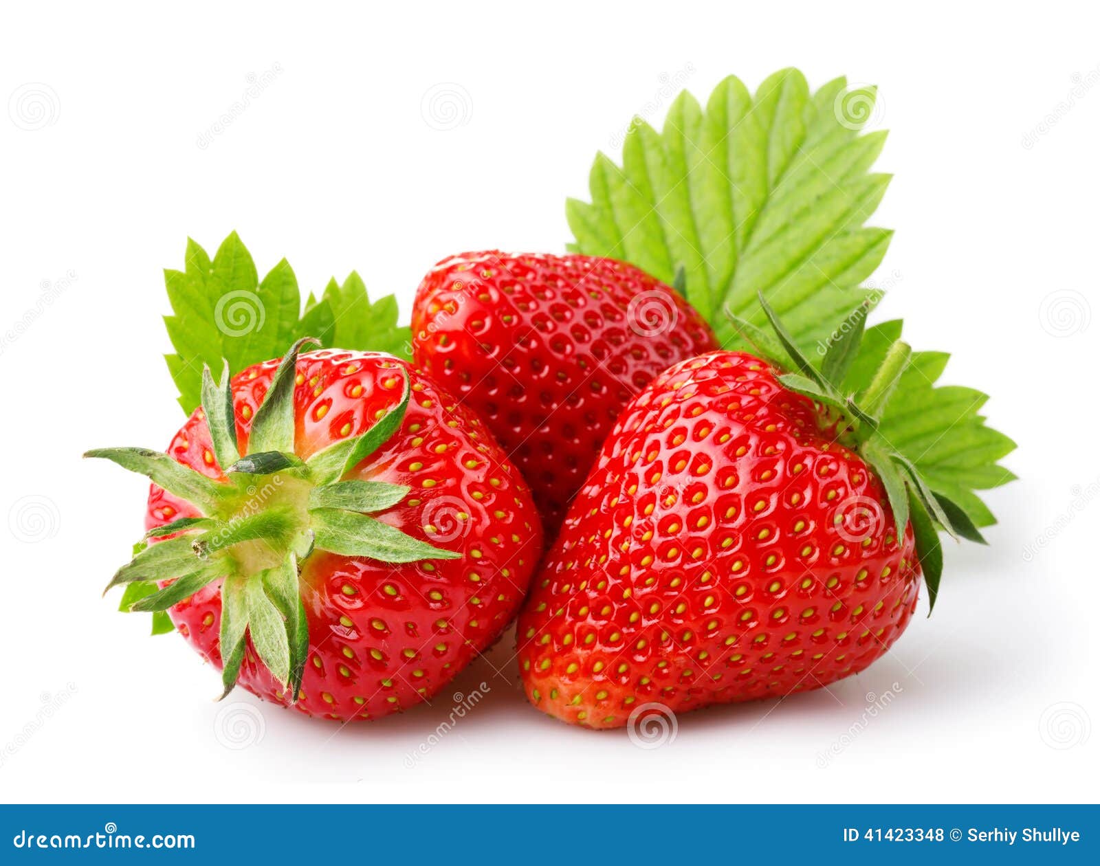 ripe strawberries with leaves  on a white