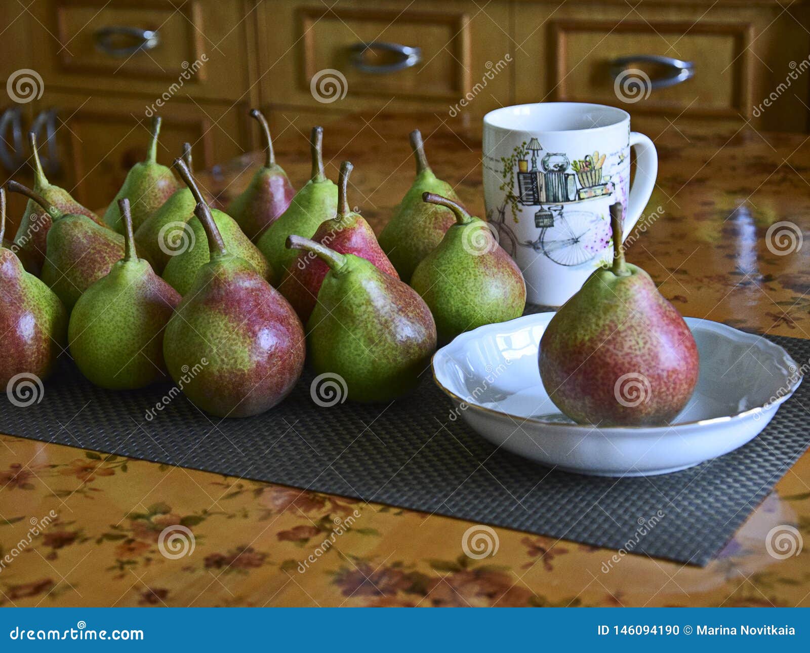 After harvesting. Ripe sweet pears on a kitchen table. The concept of natural healthy food. Organic food.