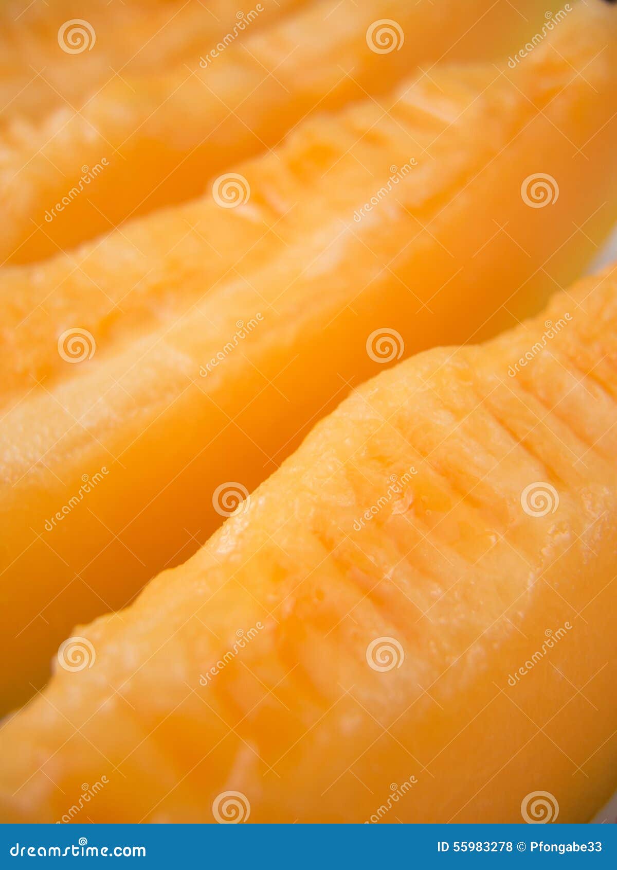 Ripe yellow melon slices stock photo. Image of closeup 55983278