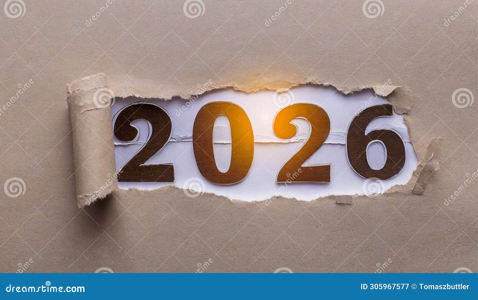 ripped brown paper revealling the year 2026 written in brown numbers on a white background