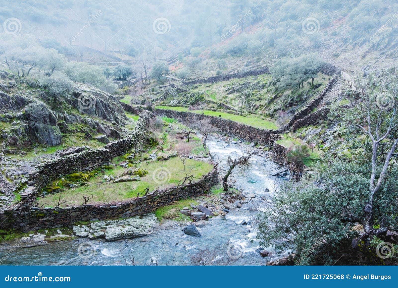 river crossing las hurdes in foggy day