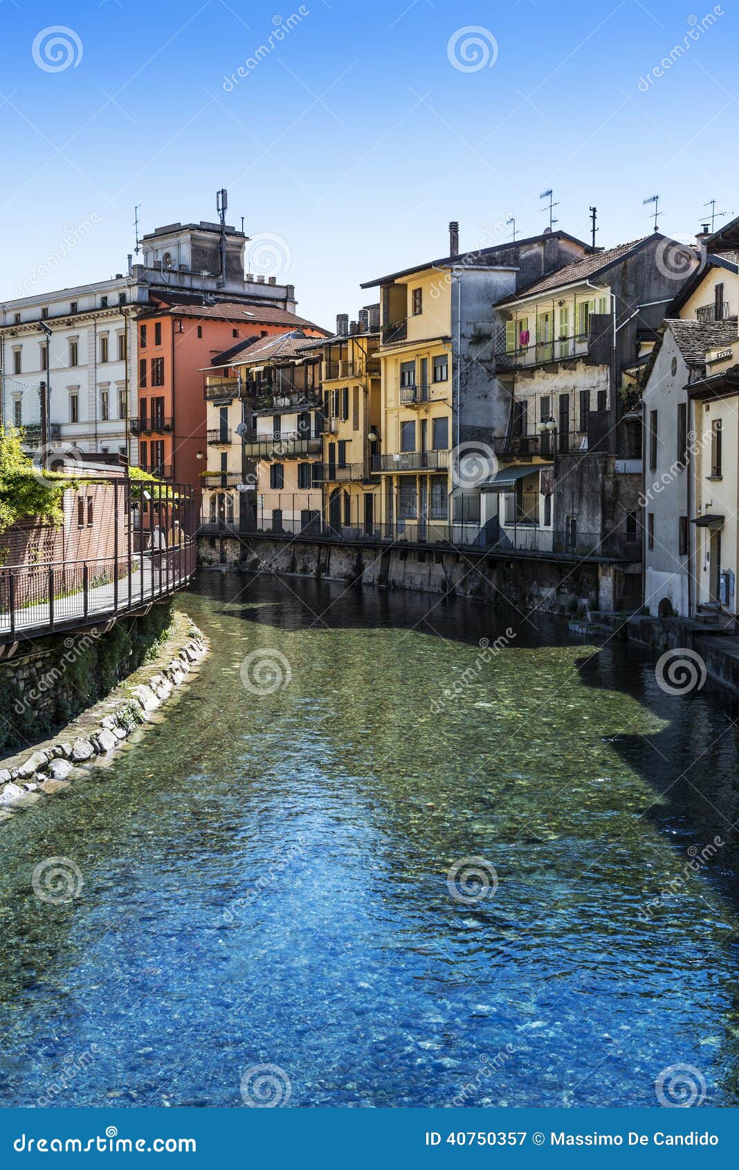 River and houses to Omega, Piedmont. A foreshortening of Omega, between houses and the river