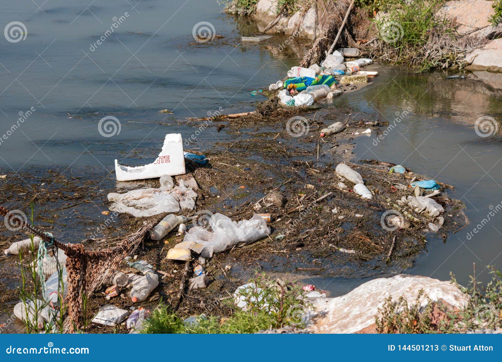 River Pollution from Plastic Editorial Stock Photo - Image of brown,  garbage: 144501213