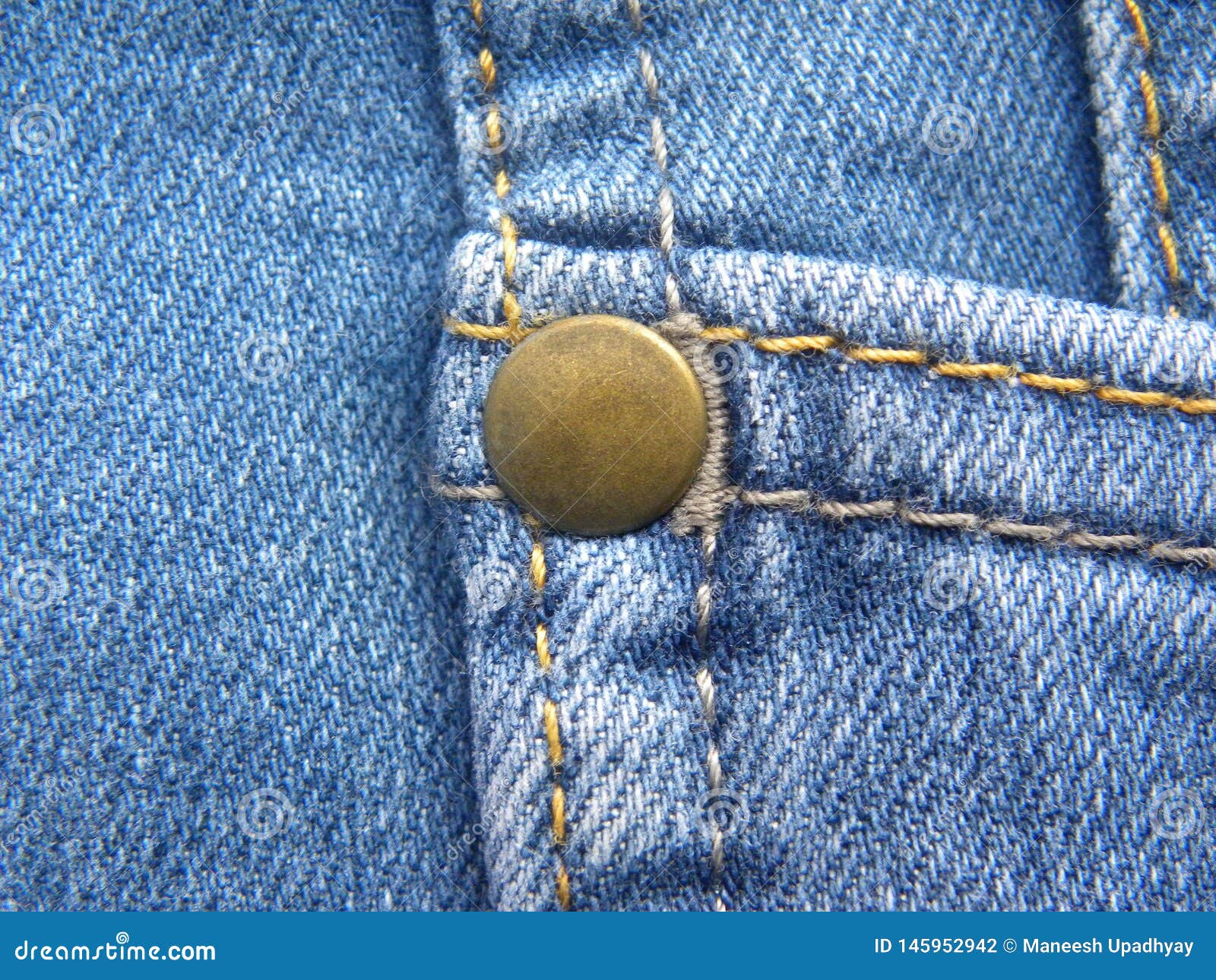 Rivet on blue color jeans stock photo. Image of detail - 145952942