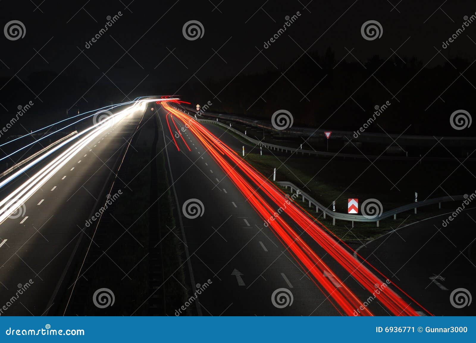 Road with Car Traffic at Night with Blurry Lights Stock Image Image