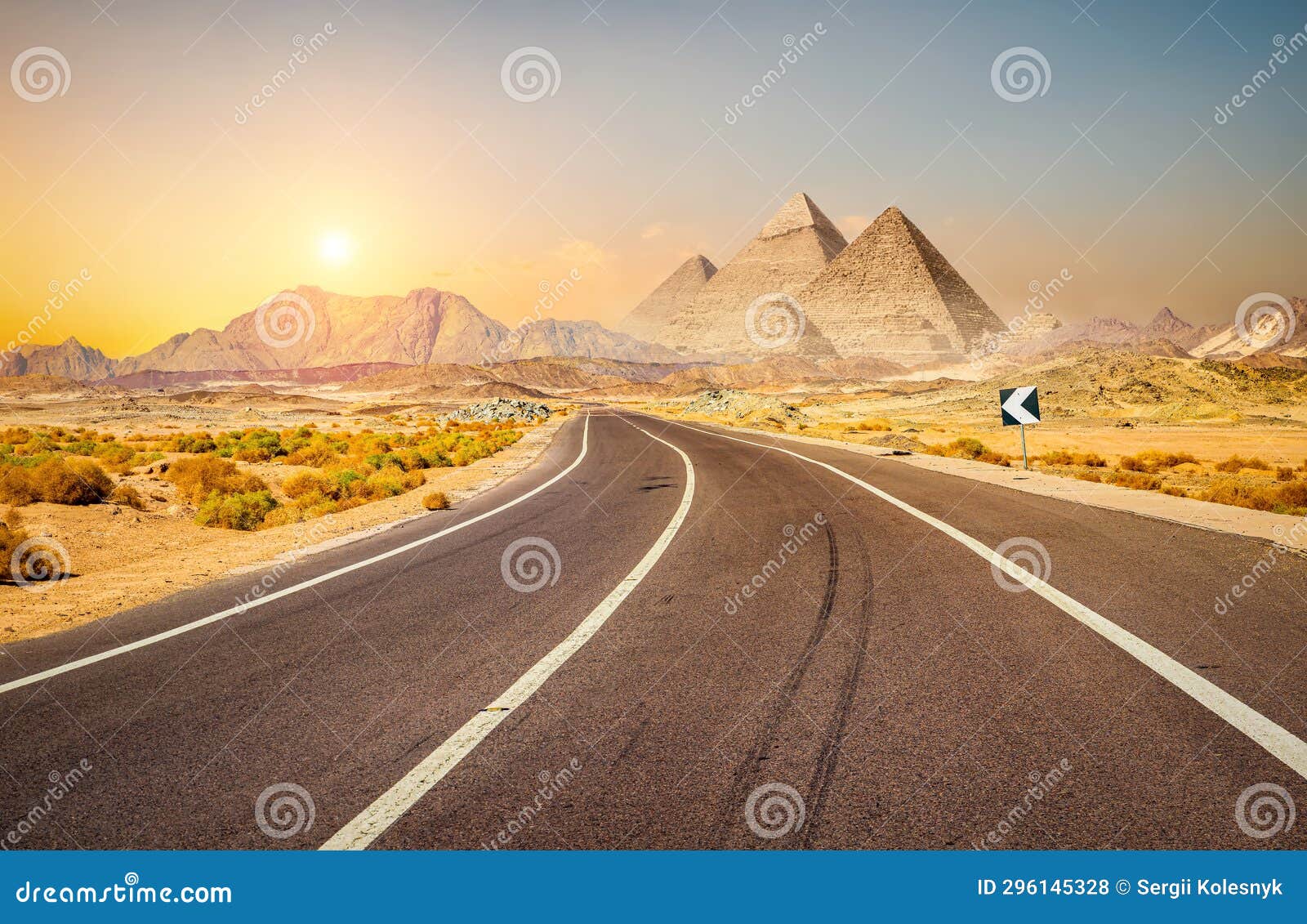 Road in Egypt and pyramids stock photo. Image of road 296145328