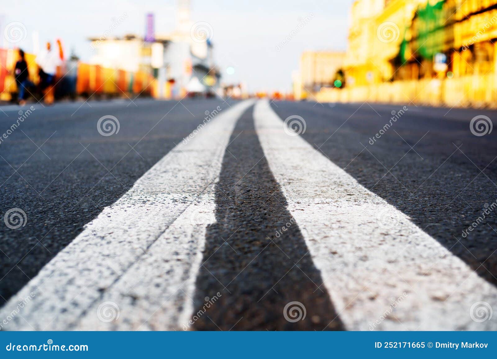 Road Markings. Double Solid White Line on a City Highway. Low Viewing