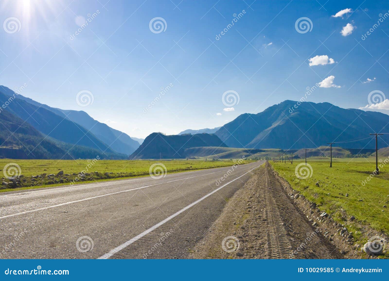 road in mountains valley, altai, summer