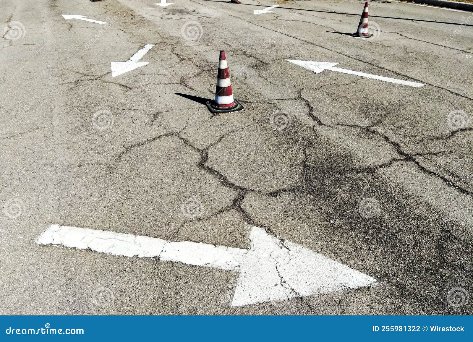 Road with Painted with White Pointers and Traffic Cones Stock Photo