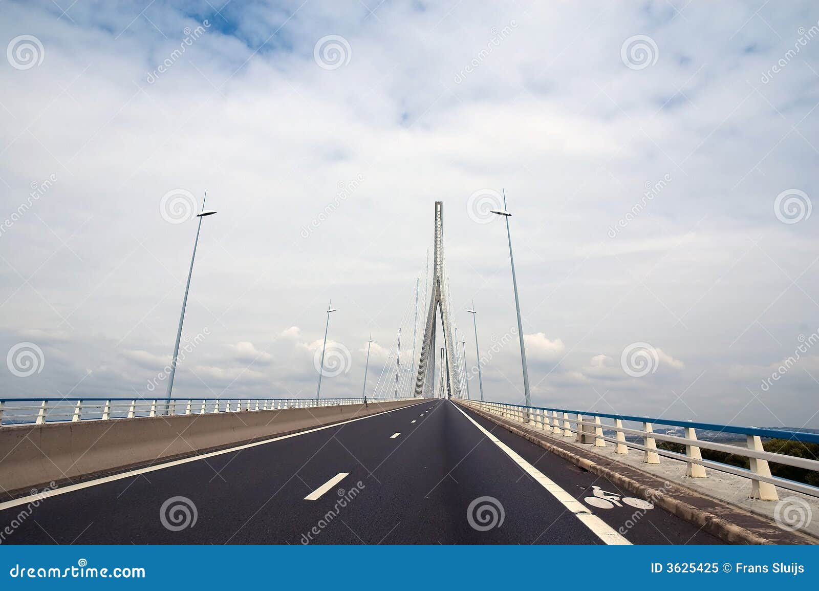 road receding over bridge