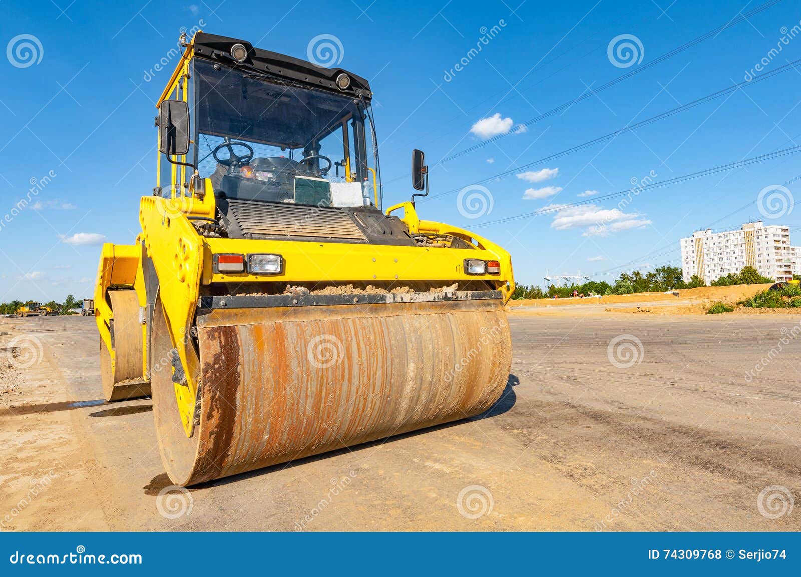 Road Roller Stands on Asphalt Surface. Stock Photo Image of stands