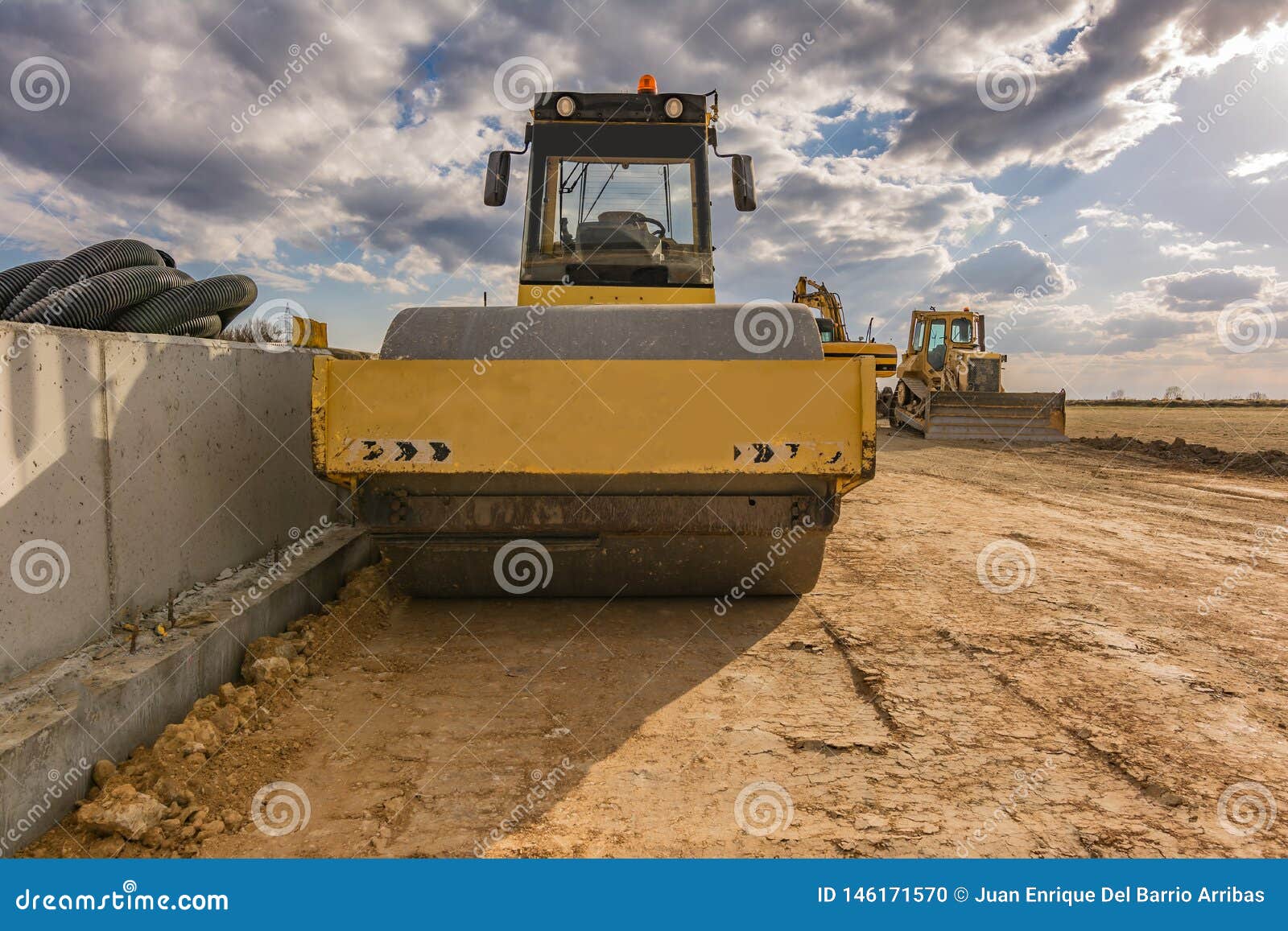 Road Roller Working the Construction of a Road Stock Photo Image of