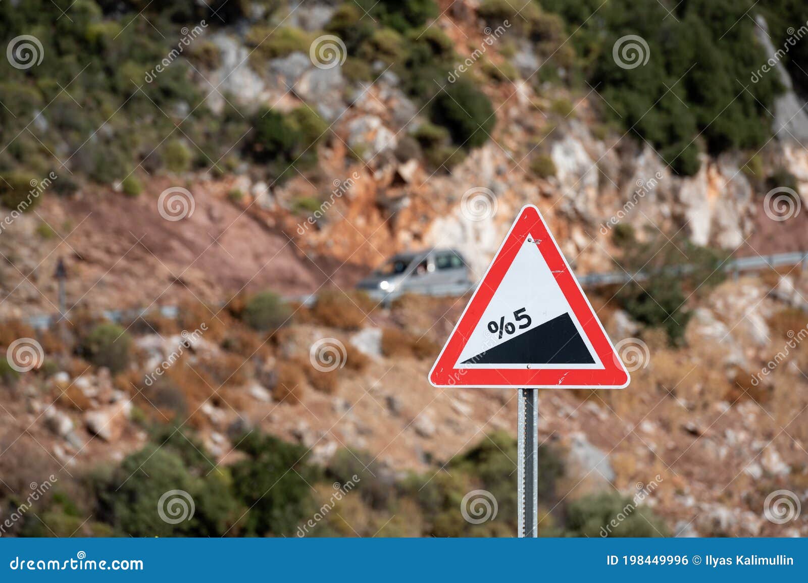 road sign informing about steep rise on the mountain serpentine