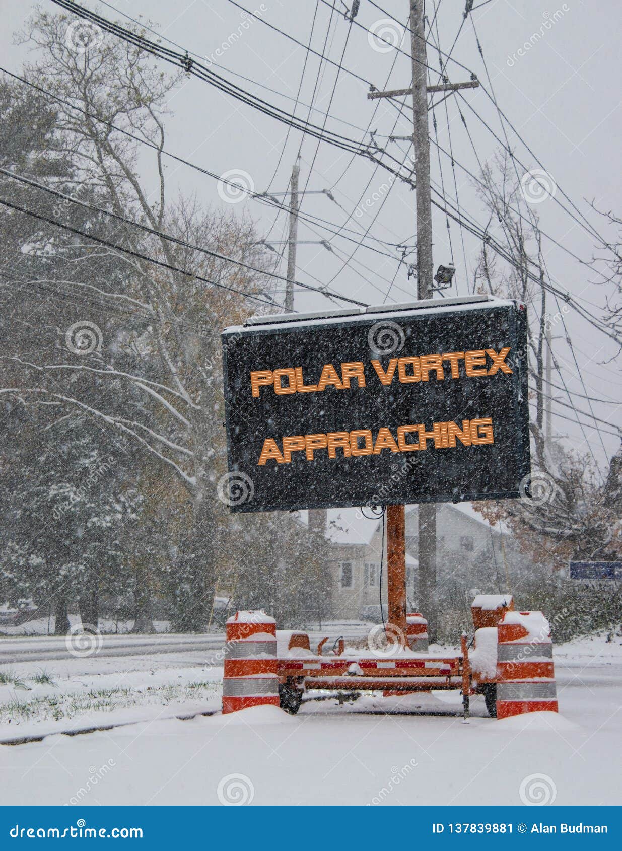 road sign in snow warning of polar vortex
