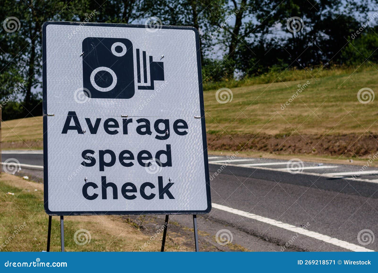 average speed check sign at the exit of a motorway services area on uk highway.