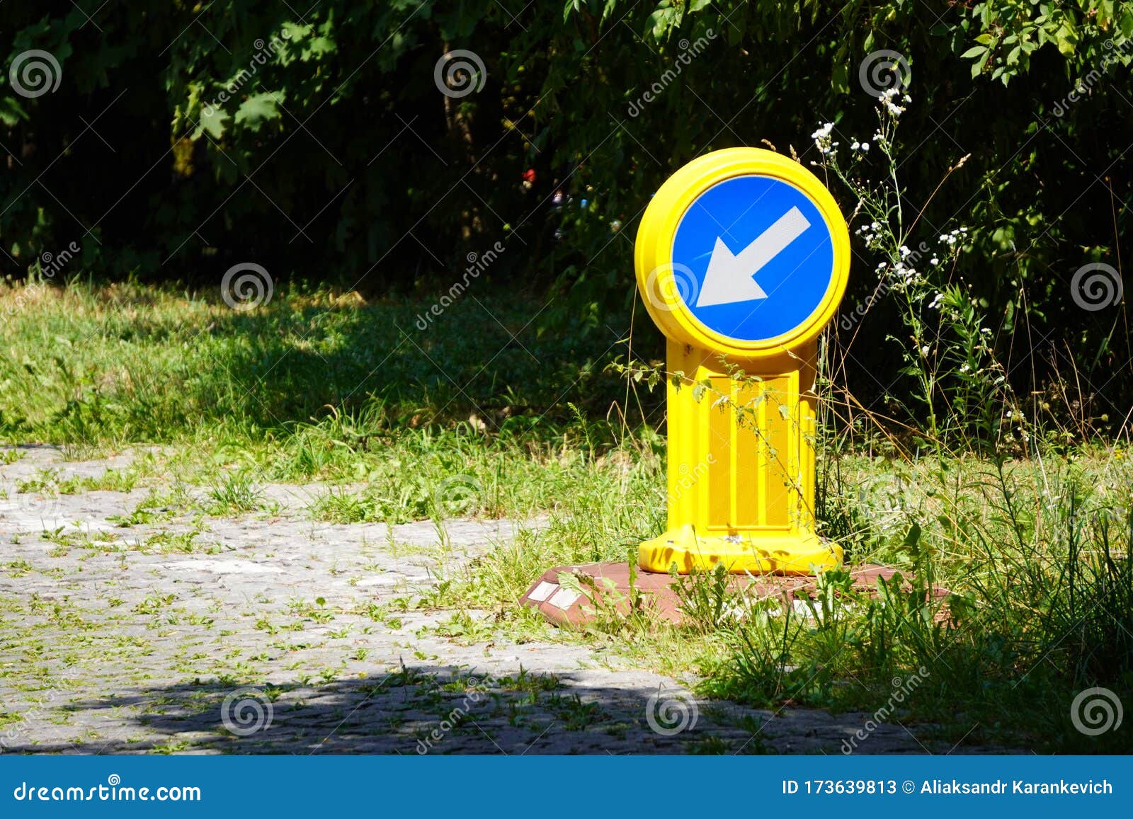 Road Sign by the Road, White Arrow on Blue Background, Driving ...
