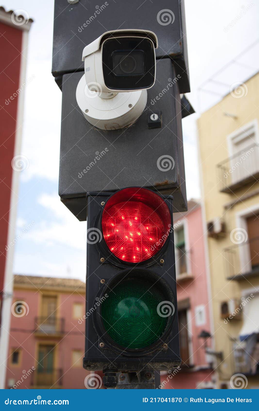 road signs.red traffic light and surveillance camera