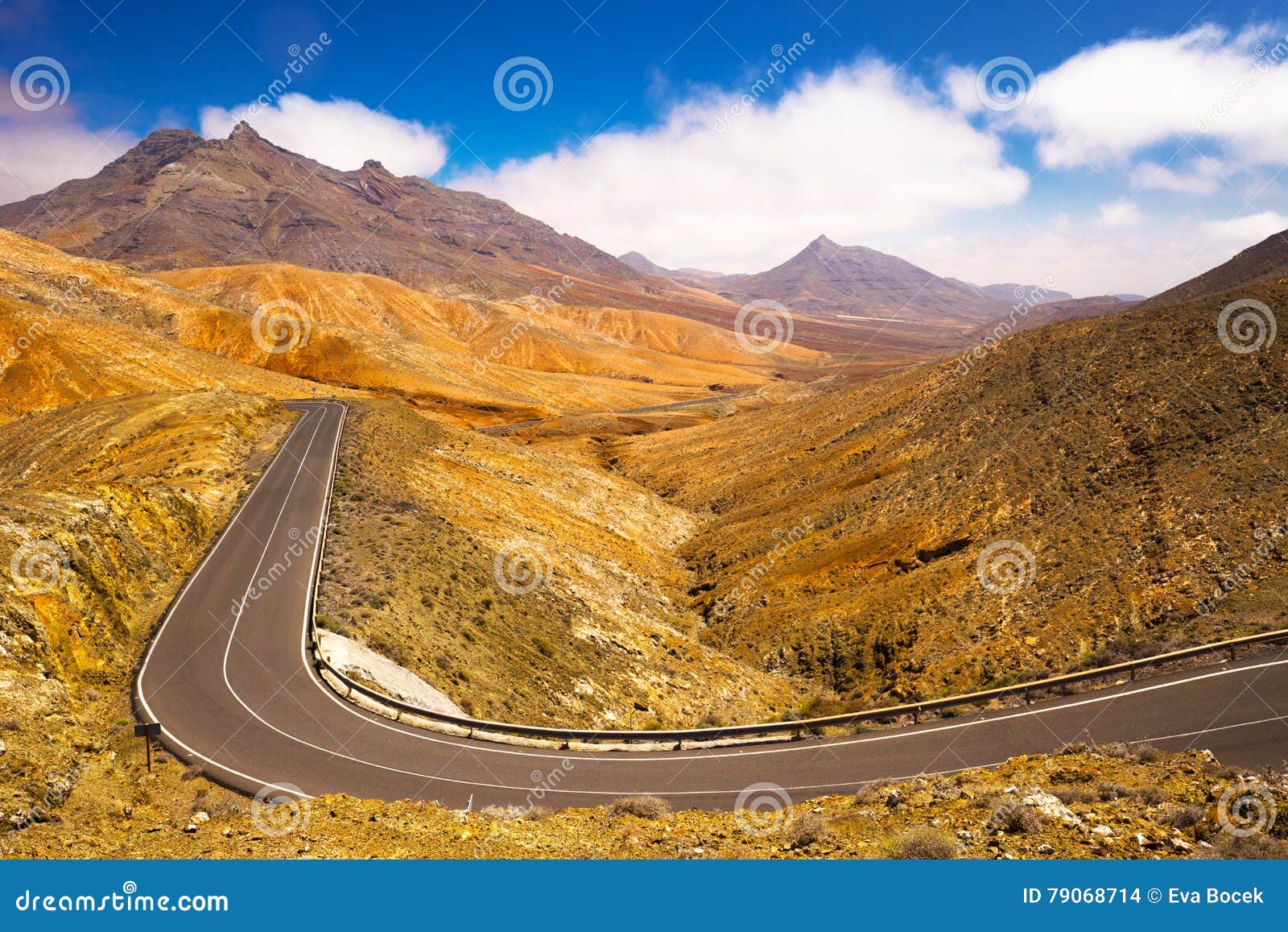 road in vulcanic landscape of fuerteventura island, canary island, spain, europe.