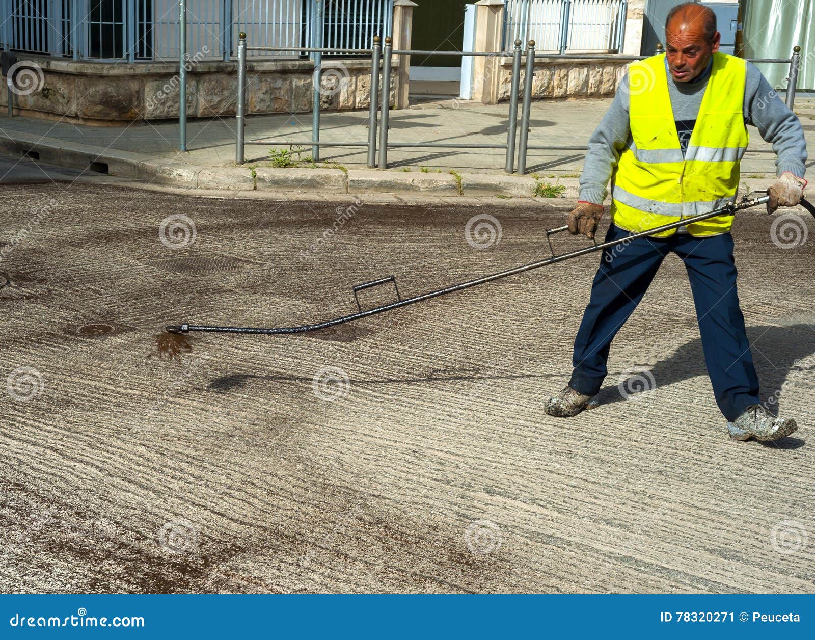 Road Worker Spraying Bitumen Emulsion Stock Image Image of dirt