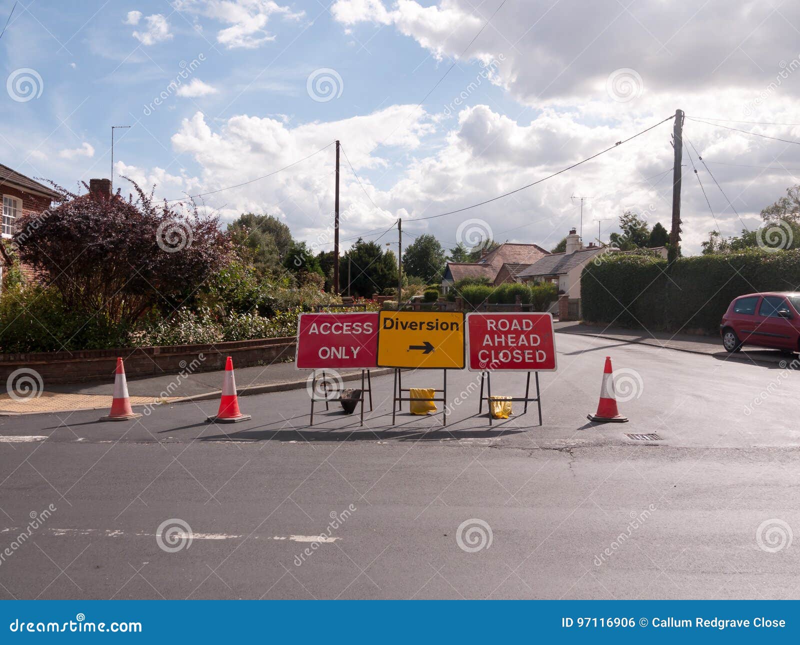 road works road blocked signs and traffic cones diversion access