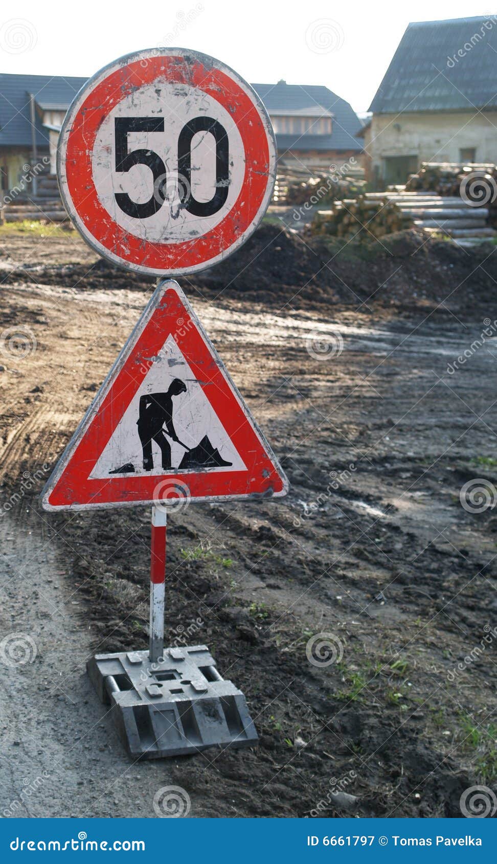 roadwork and slowdown sign