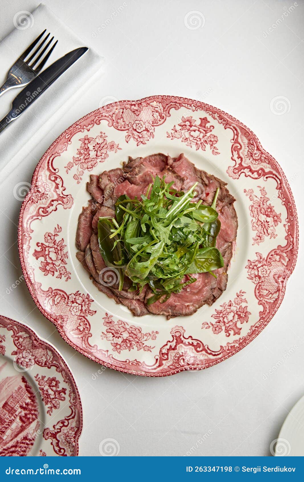 Roast Beef with Fresh Herbs on a Beautiful Plate Stock Photo Image of