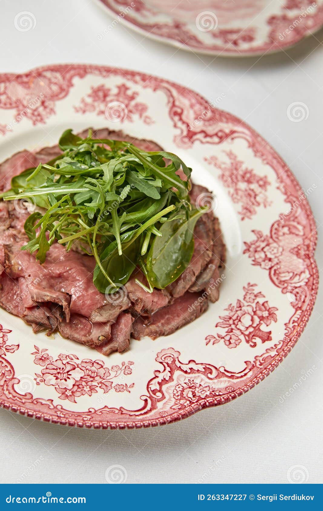 Roast Beef with Fresh Herbs on a Beautiful Plate Stock Image Image of