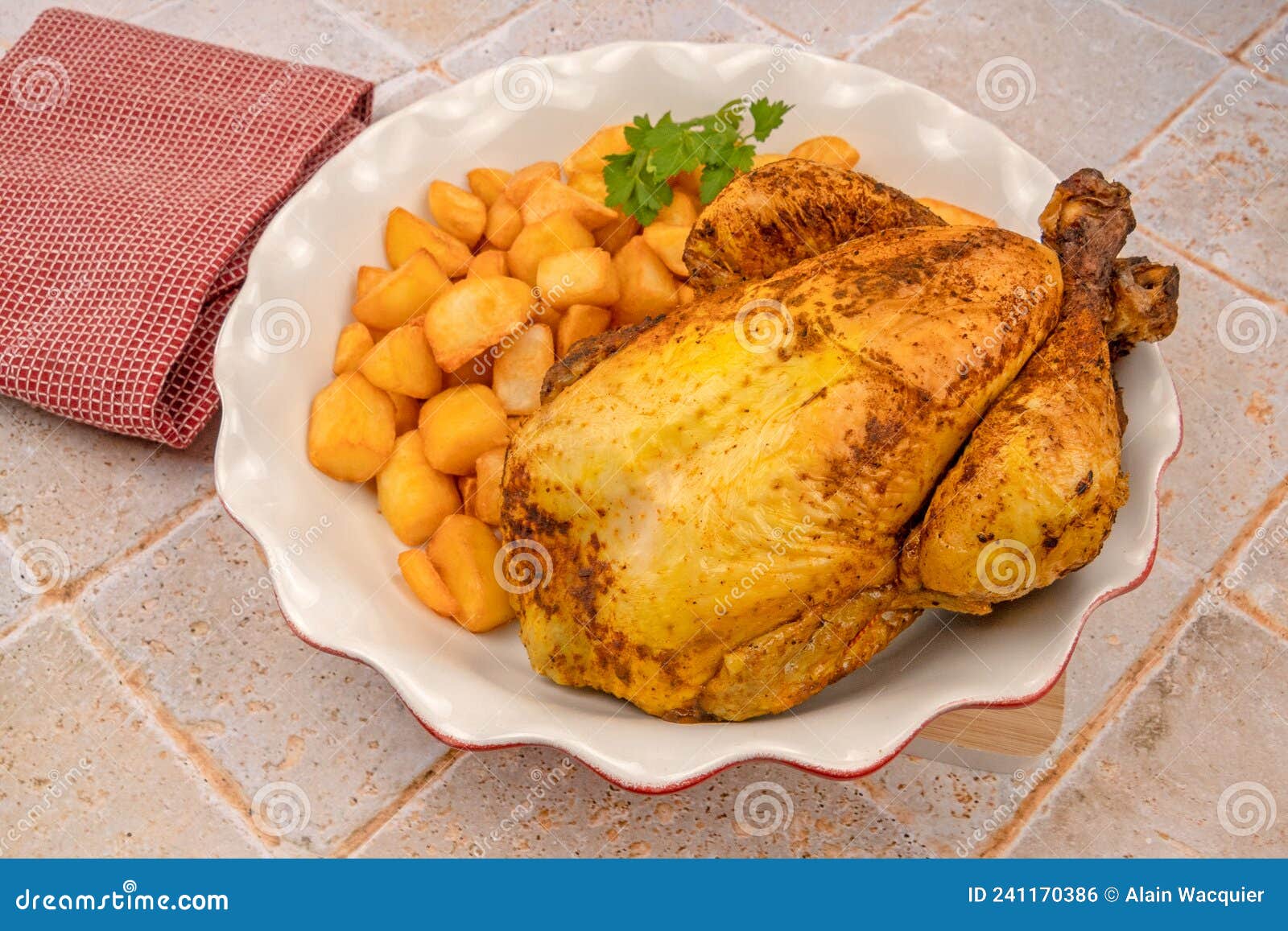 Roast Chicken in a Dish with Potatoes Stock Photo - Image of spoon
