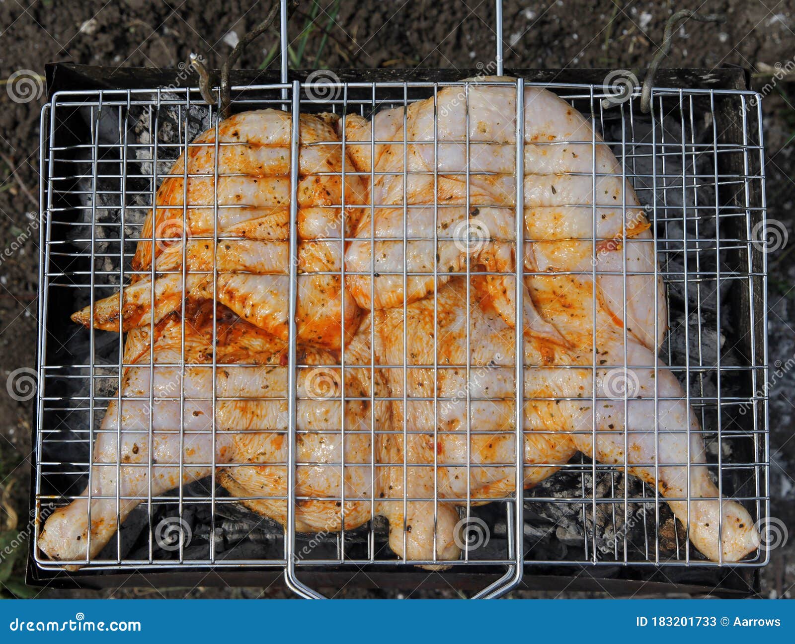 Roast chicken on grill stock image. Image of drumstick 183201733