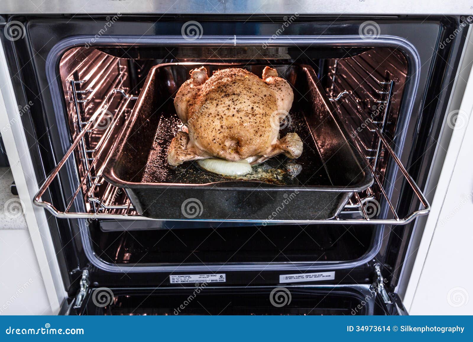 Roast Chicken in the Oven stock photo. Image of cuisine 34973614