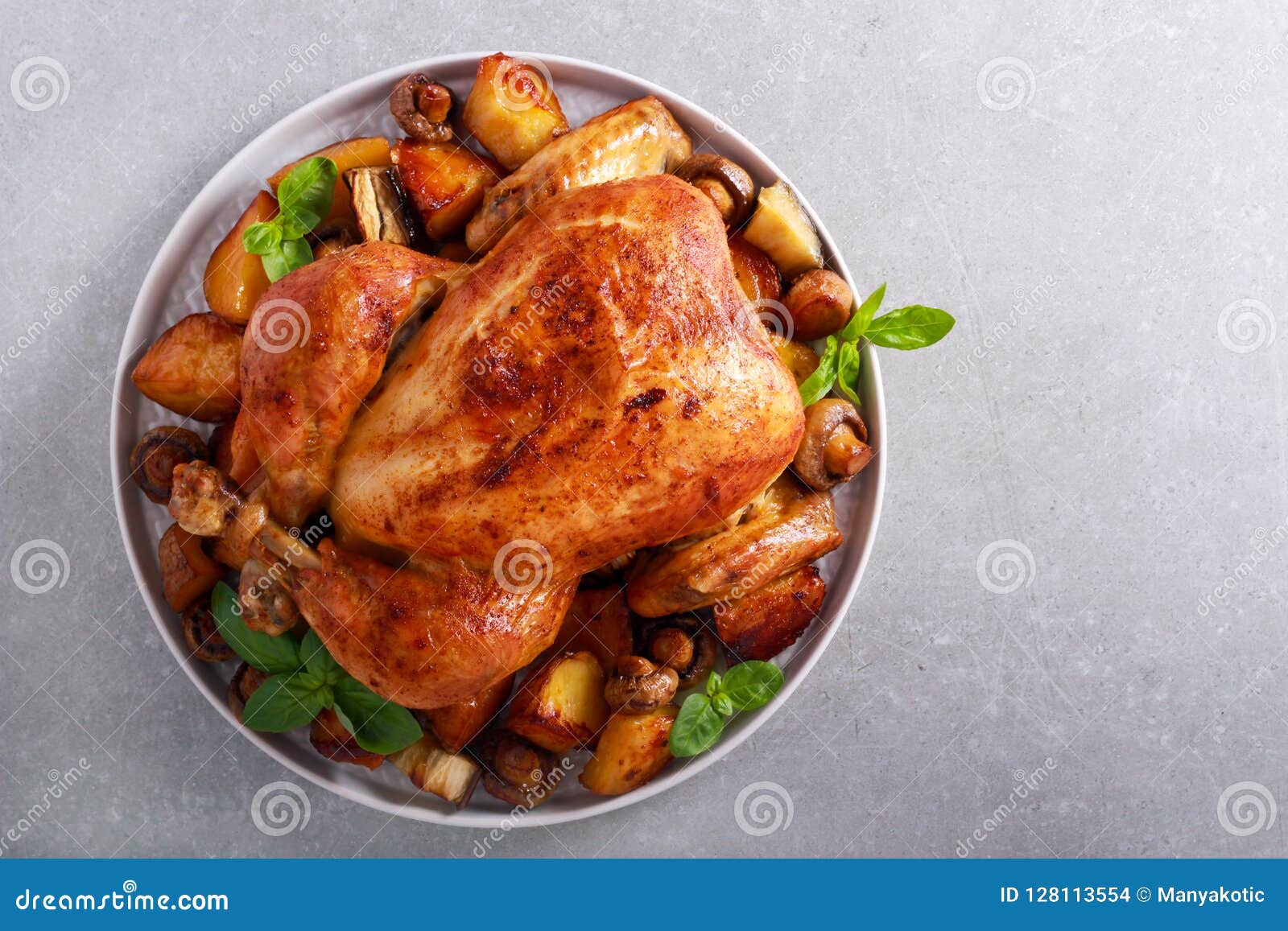 Roast Chicken with Roast Potatoes and Mushrooms Stock Photo Image of